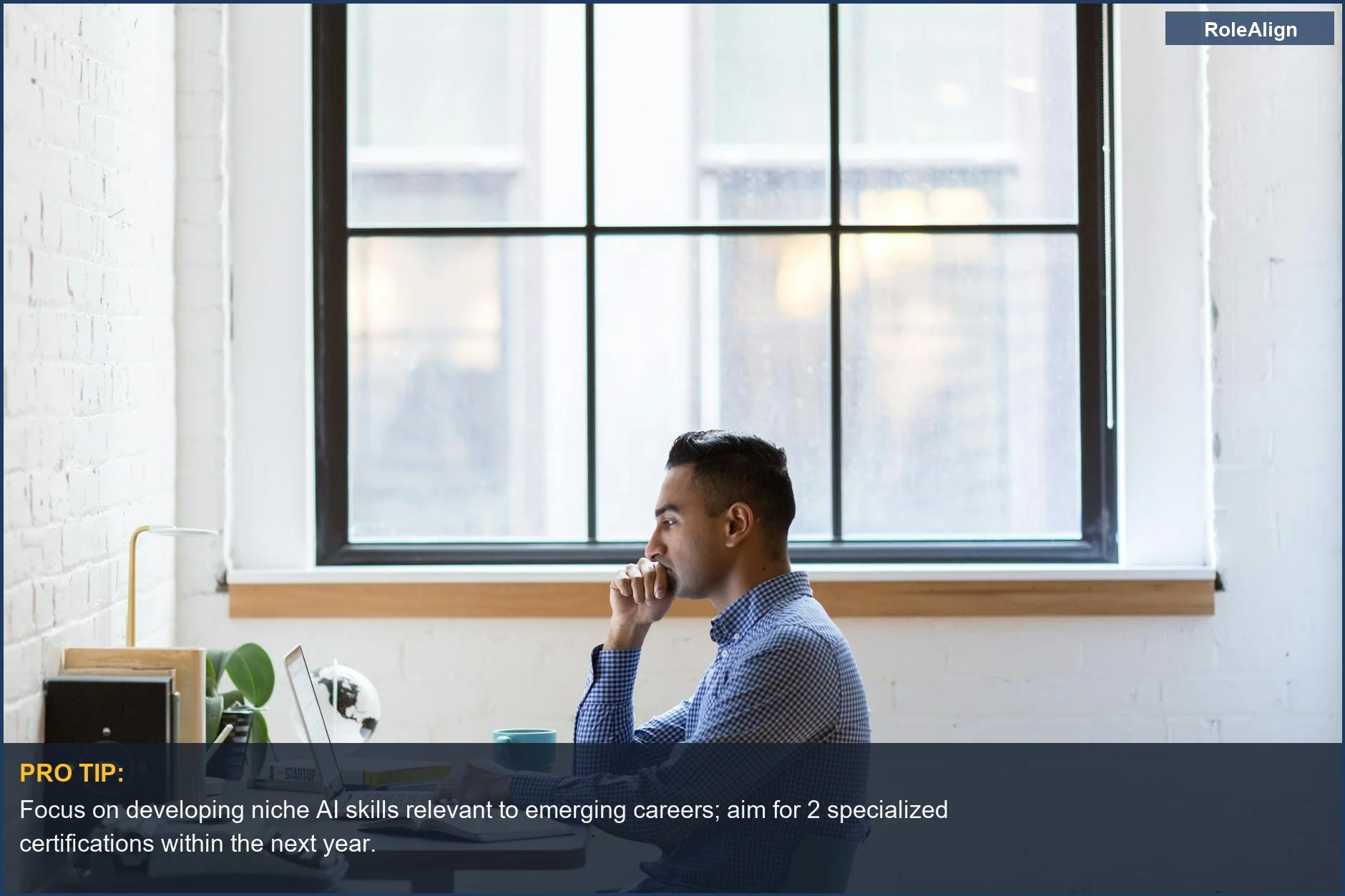 Professional man analyzing data on laptop, preparing for future AI jobs in a modern office setting.