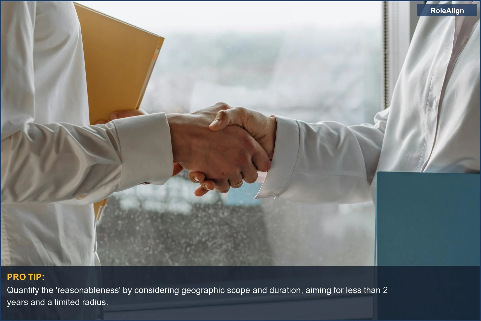 Business professionals shaking hands indoors, symbolizing a non-compete agreement's potential enforceability.