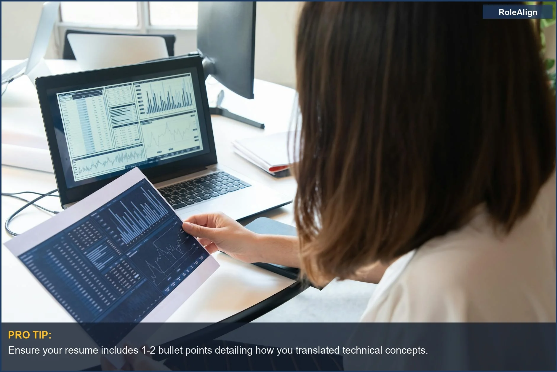 Woman reviewing financial charts for insights, reflecting AI's analysis of resume soft skills.