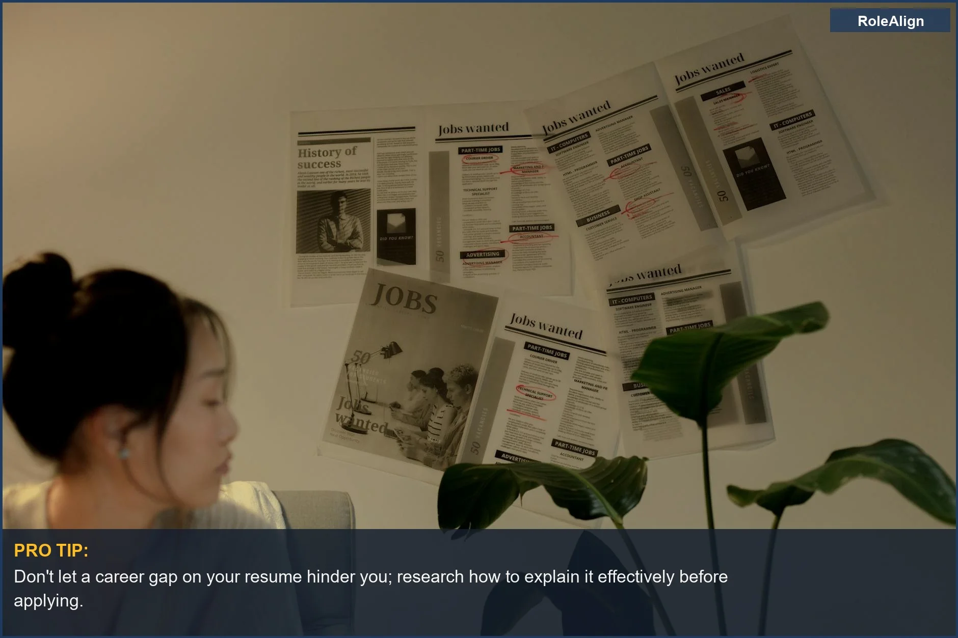 Woman looking thoughtfully indoors with plants and job postings, contemplating her career path.