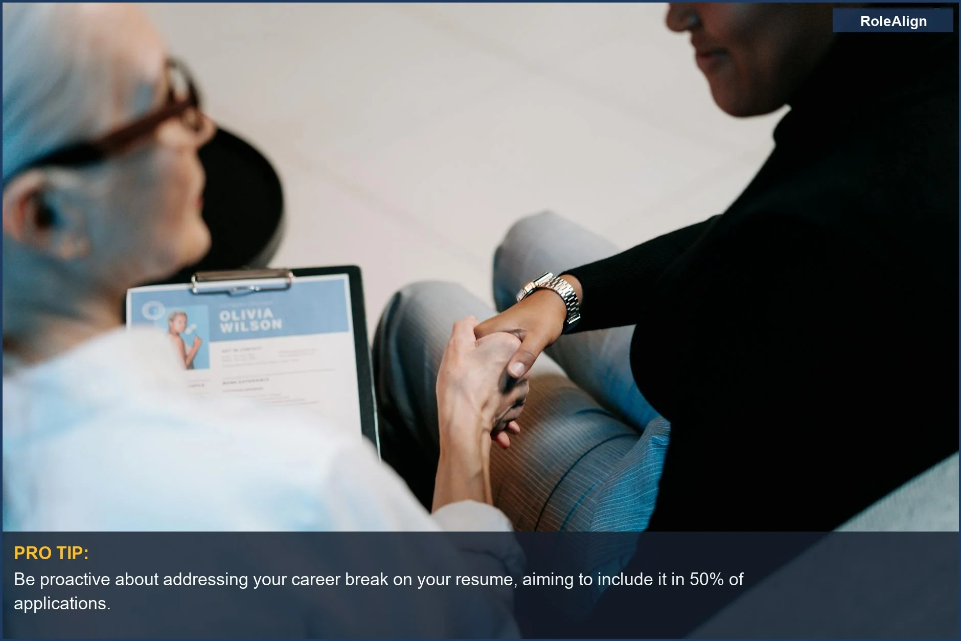 Two professional women shaking hands, symbolizing recruitment and building professional connections.