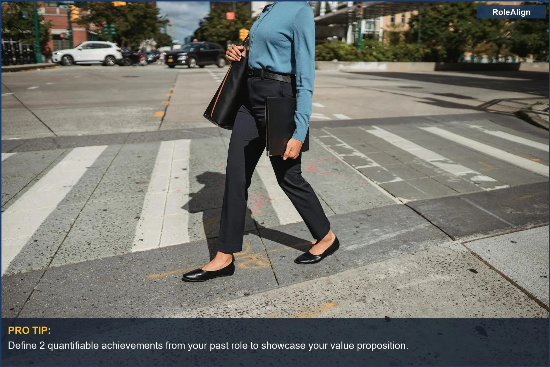 Stylish professional woman confidently crossing a city street, symbolizing a career pivot.