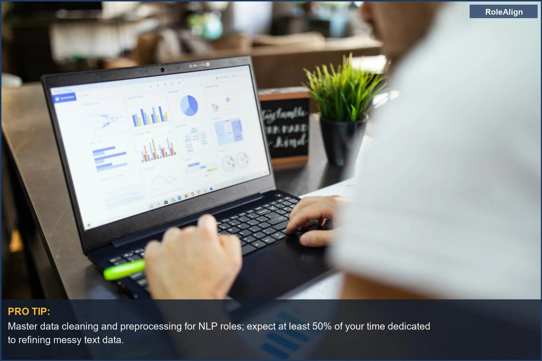 Business analyst meticulously examining charts and graphs on a laptop, illustrating the practical, data-driven nature of AI careers.
