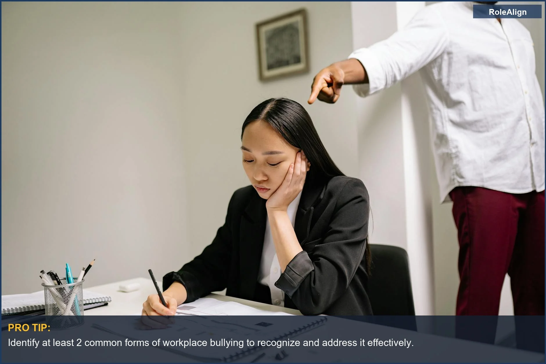 Unhappy employee enduring workplace bullying with colleagues pointing fingers at them.