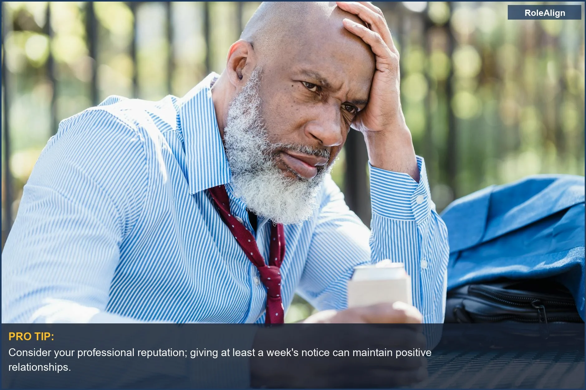 Stressed businessman outdoors contemplating his job, realizing no two weeks notice is required legally.