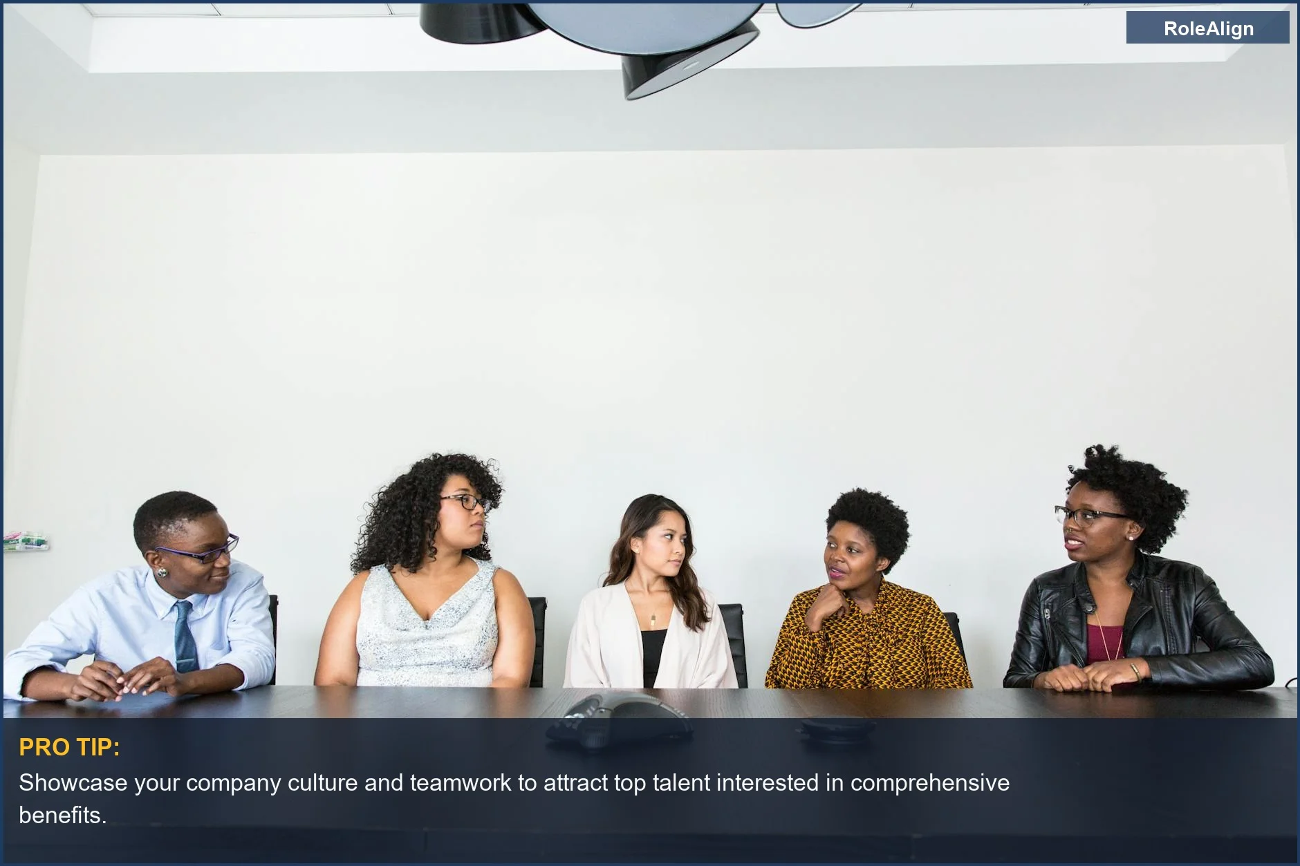 Diverse professionals collaborating in a modern office, highlighting key employee benefits and compensation strategies.