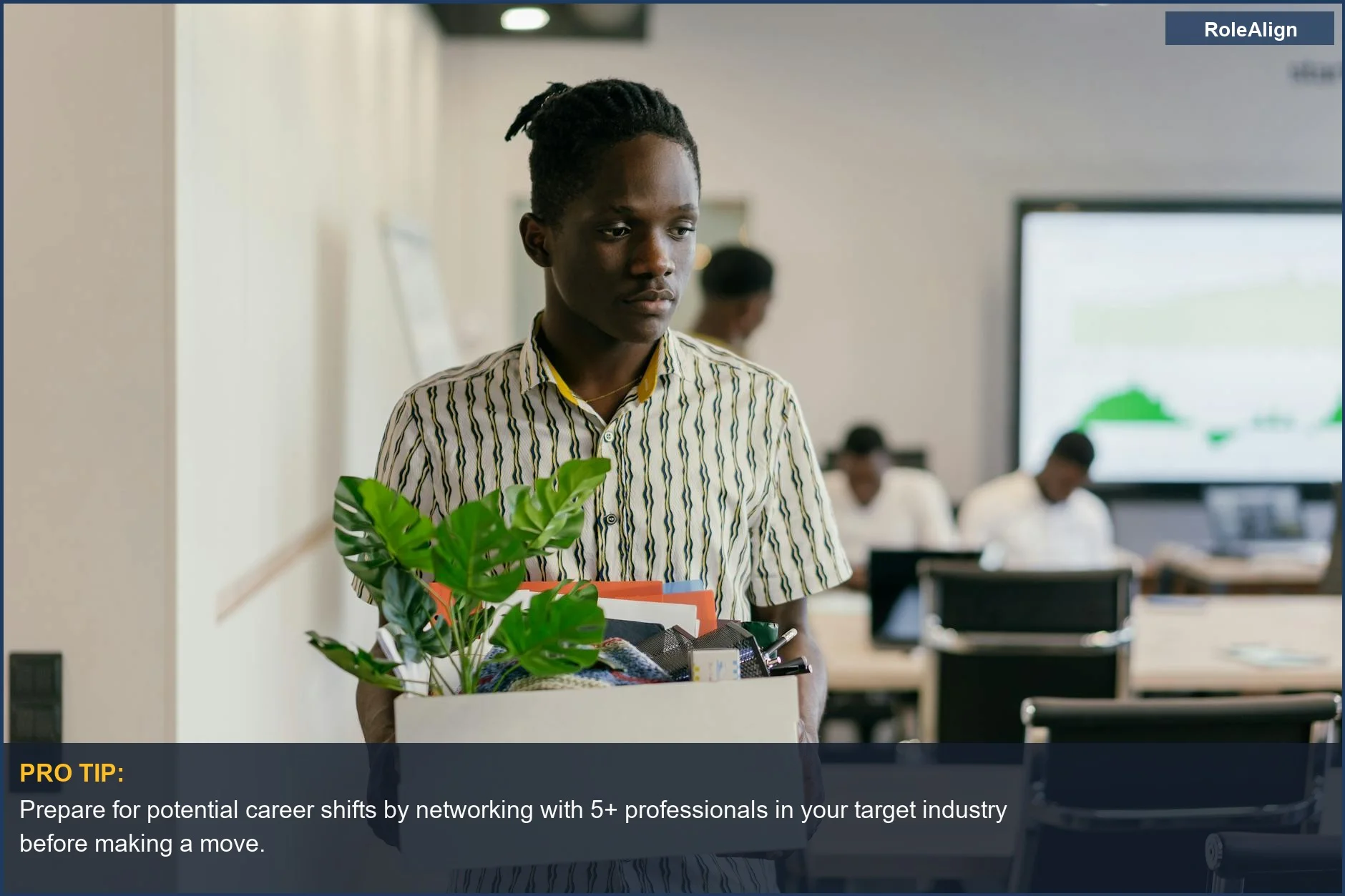 Navigating an engineering career pivot reddit—man carrying box, illustrating the need for a strategic approach to job changes.