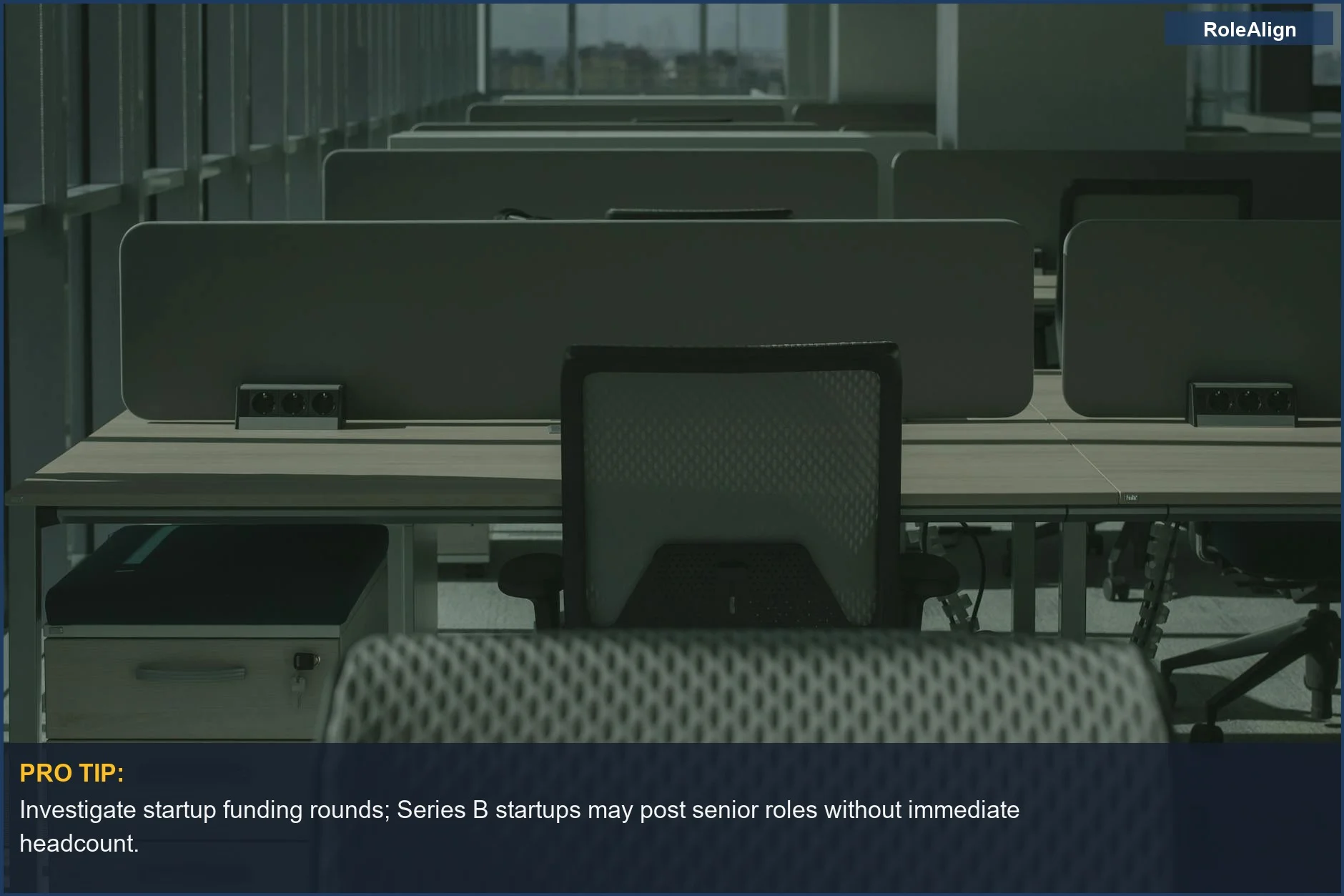 Empty modern office workspace with desks and chairs, highlighting senior roles in ghost jobs.