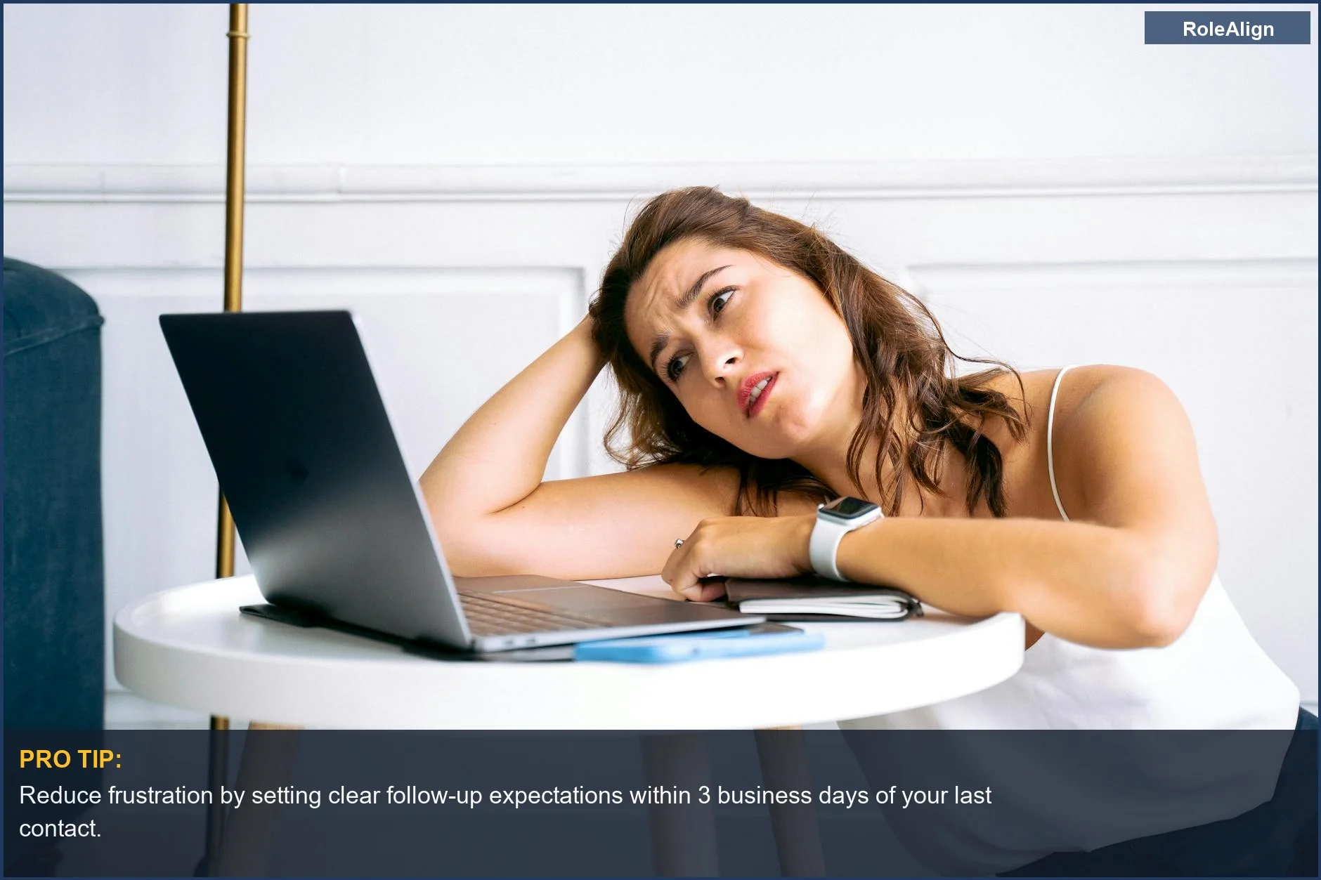 Frustrated candidate looking at laptop, a common sign of ghosting after final interview.