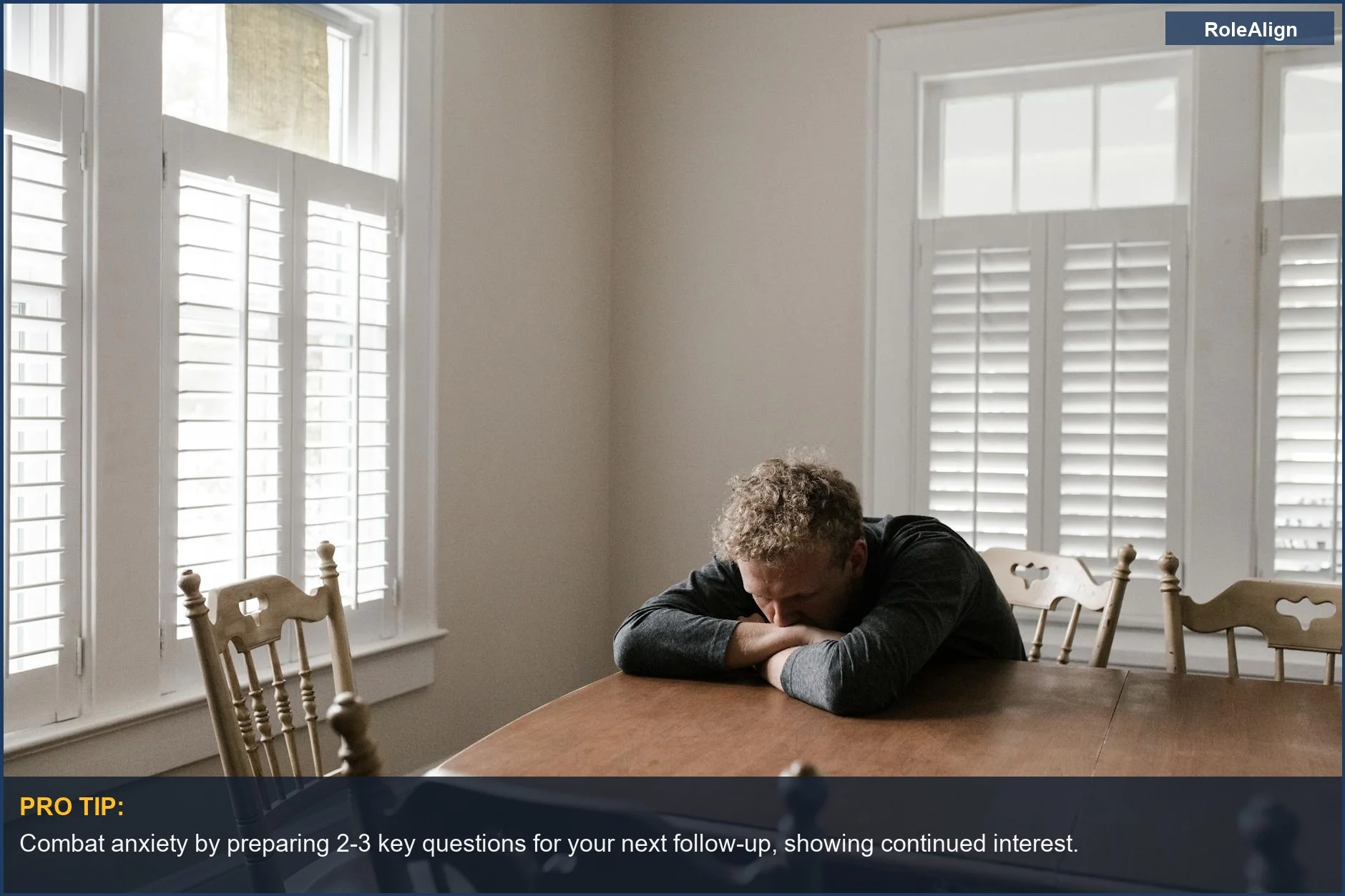 Sad man contemplating job loss after being ghosted following a final interview process.