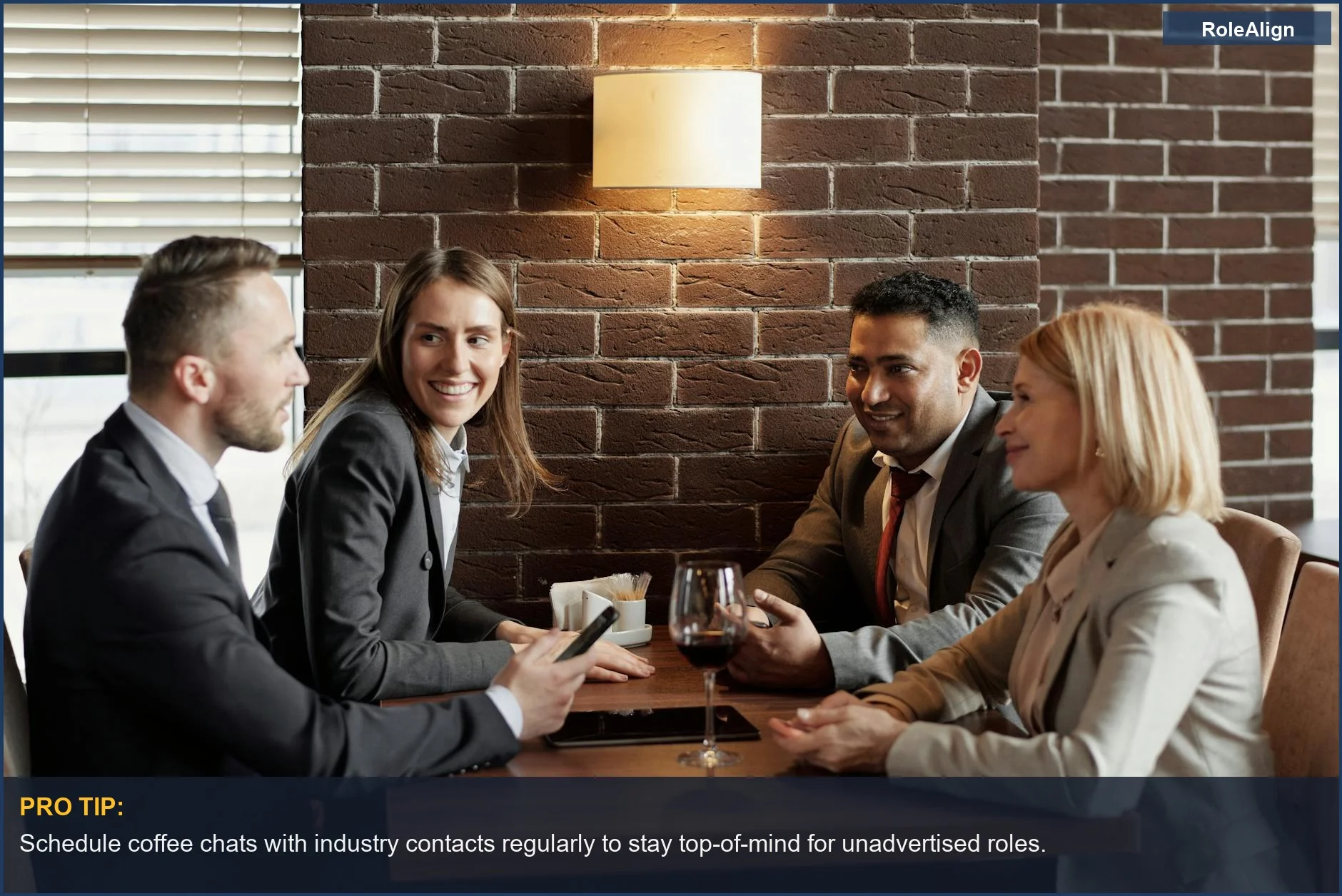 Business professionals in lively discussion at a modern cafe, emphasizing networking over applying online.