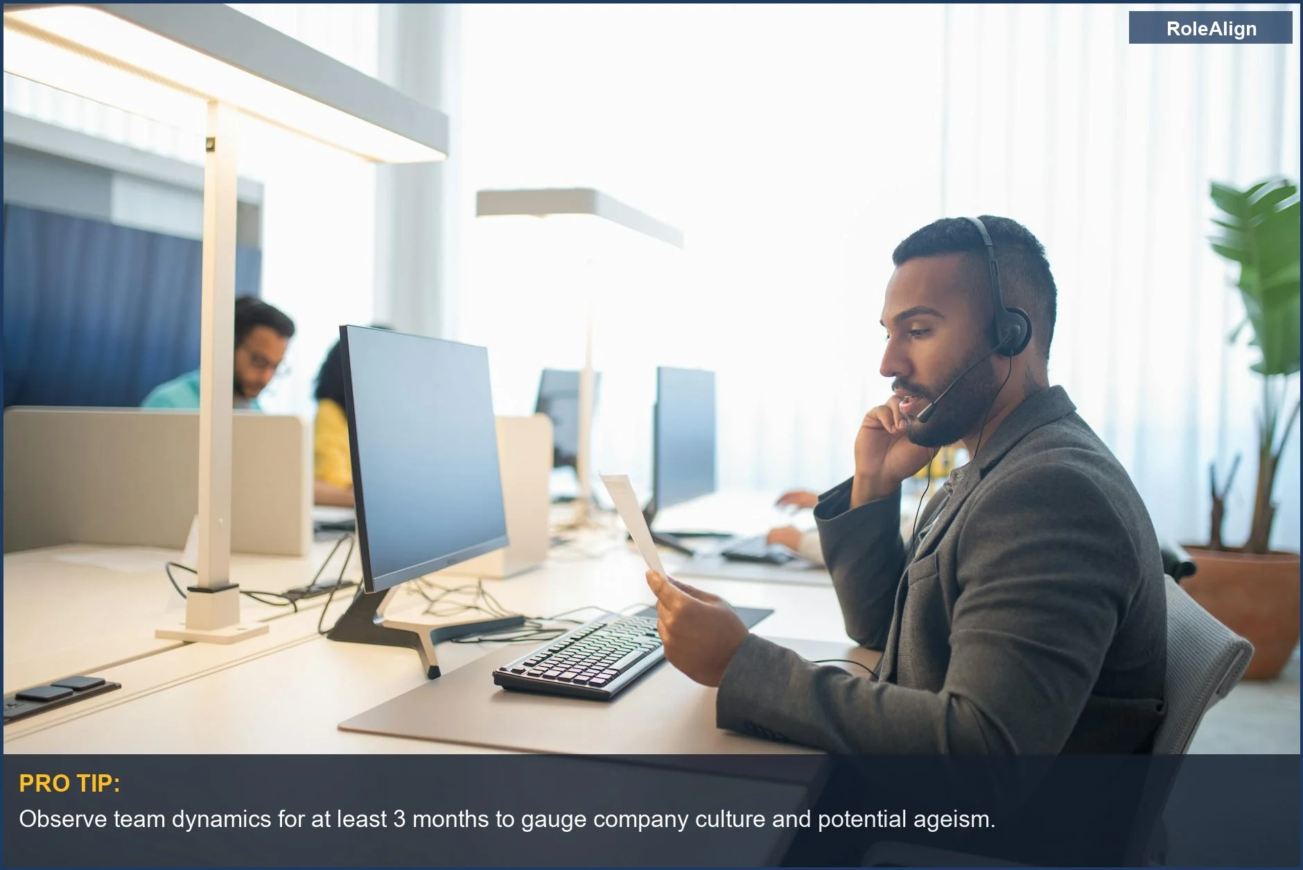 Professionals collaborating in a modern office, highlighting how subtle cues can lead to age bias in employment.