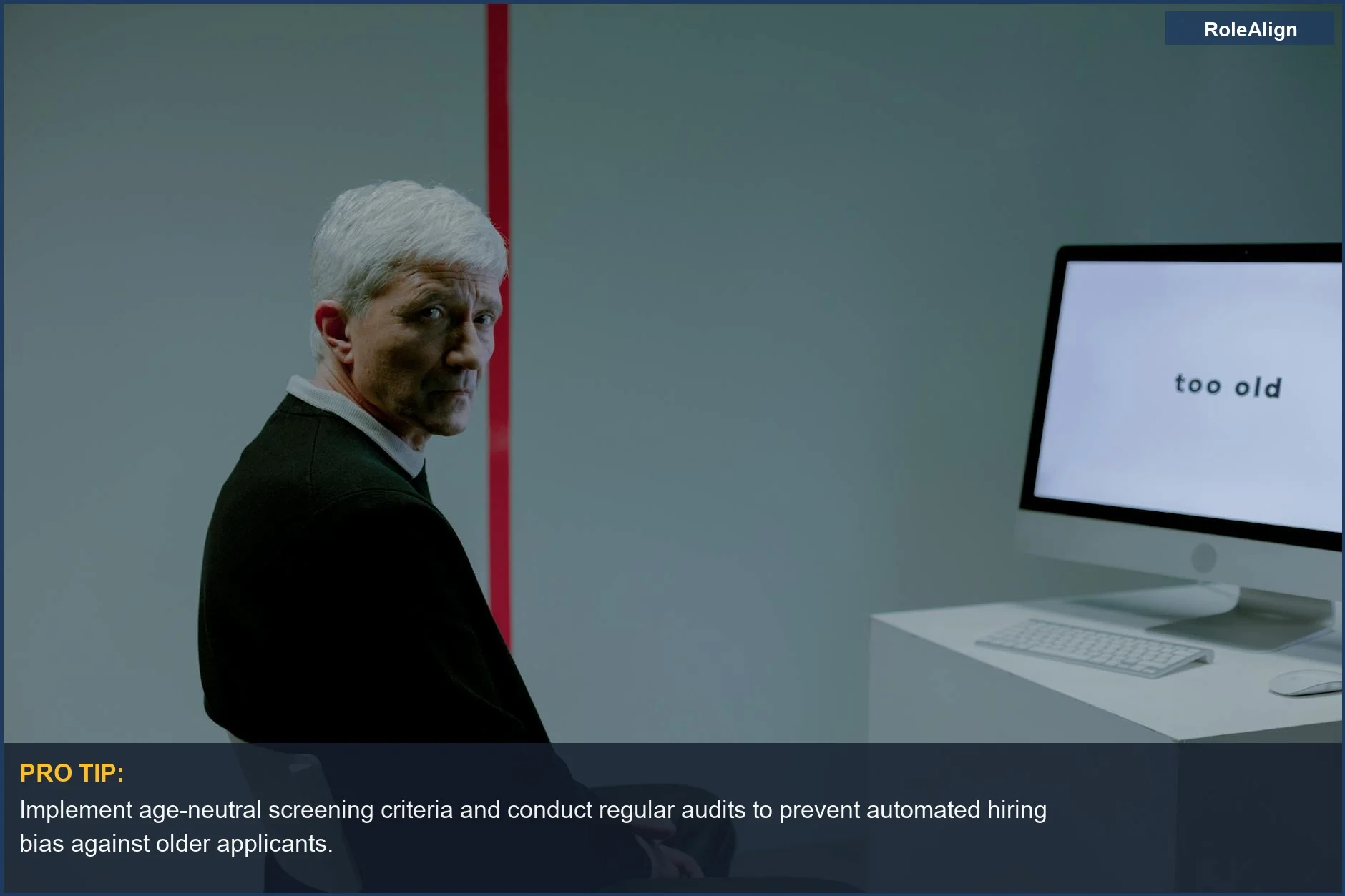 Senior man facing age discrimination with an on-screen message, demonstrating AI hiring discrimination risks.