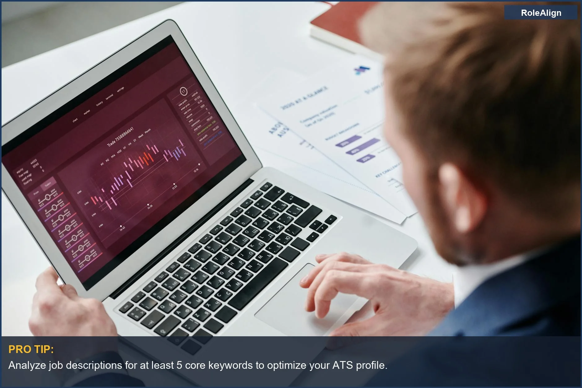 Businessman analyzes data analytics dashboard on laptop, demonstrating how ATS systems adapt to new trends.