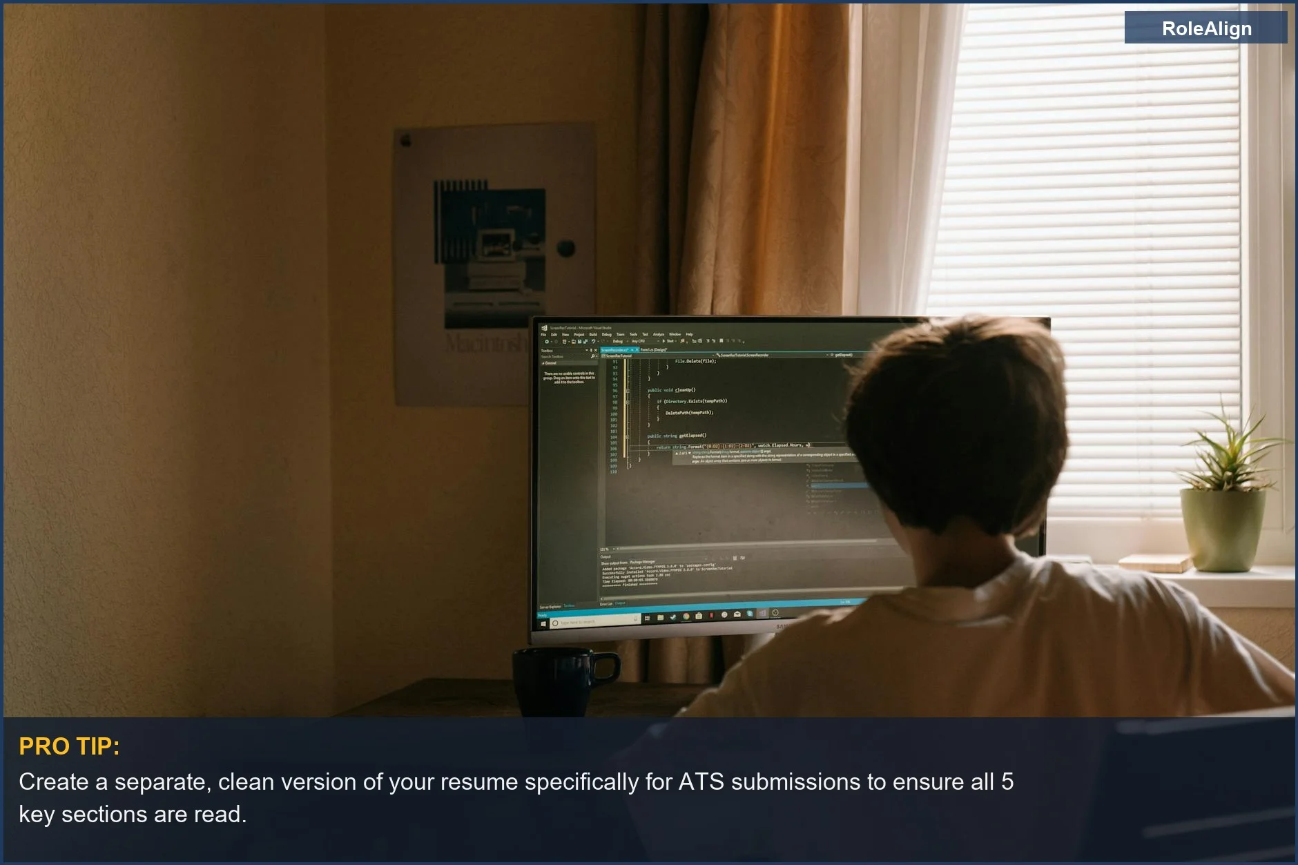 Young person programming at a home desk, symbolizing the need for ATS-friendly resumes when facing job applications.