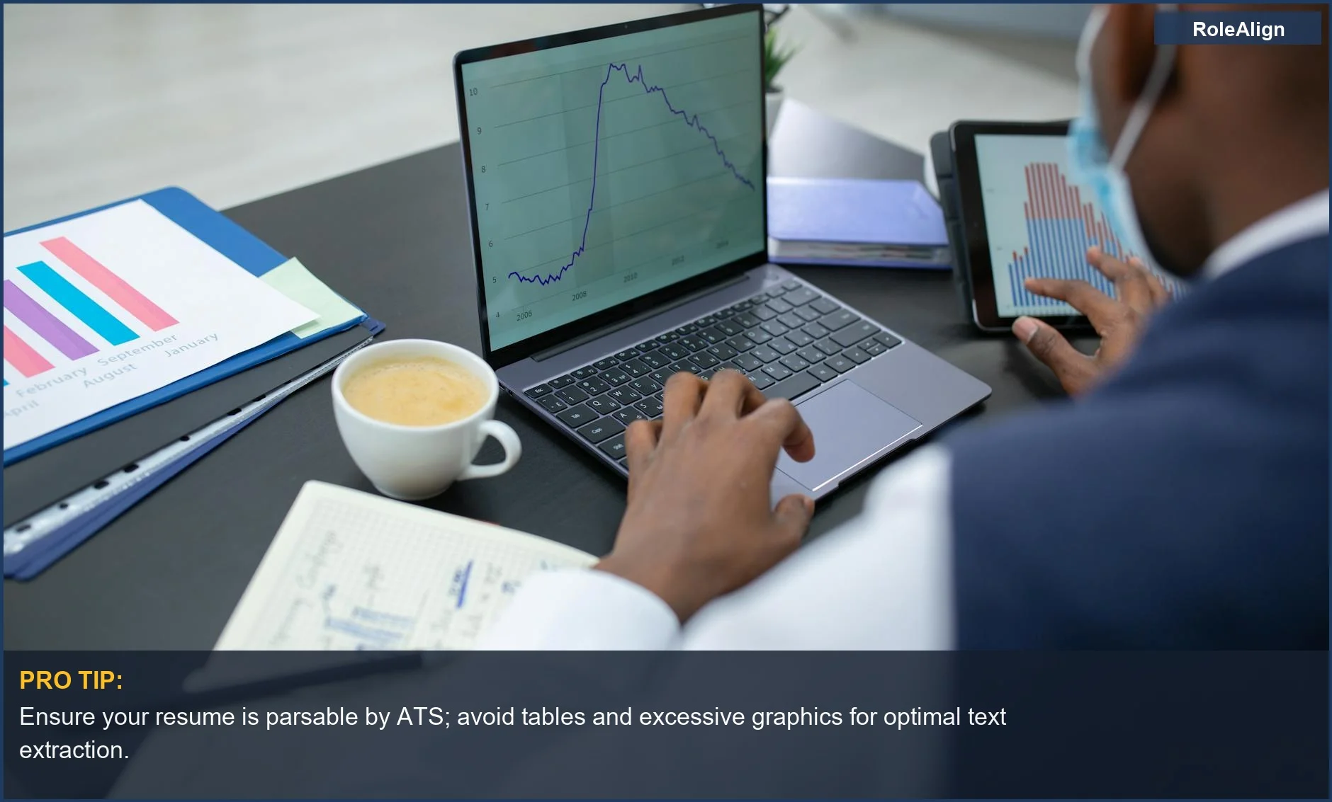 Professional analyzing complex data on laptop and tablet, illustrating ATS parsing beyond basic keyword checks.