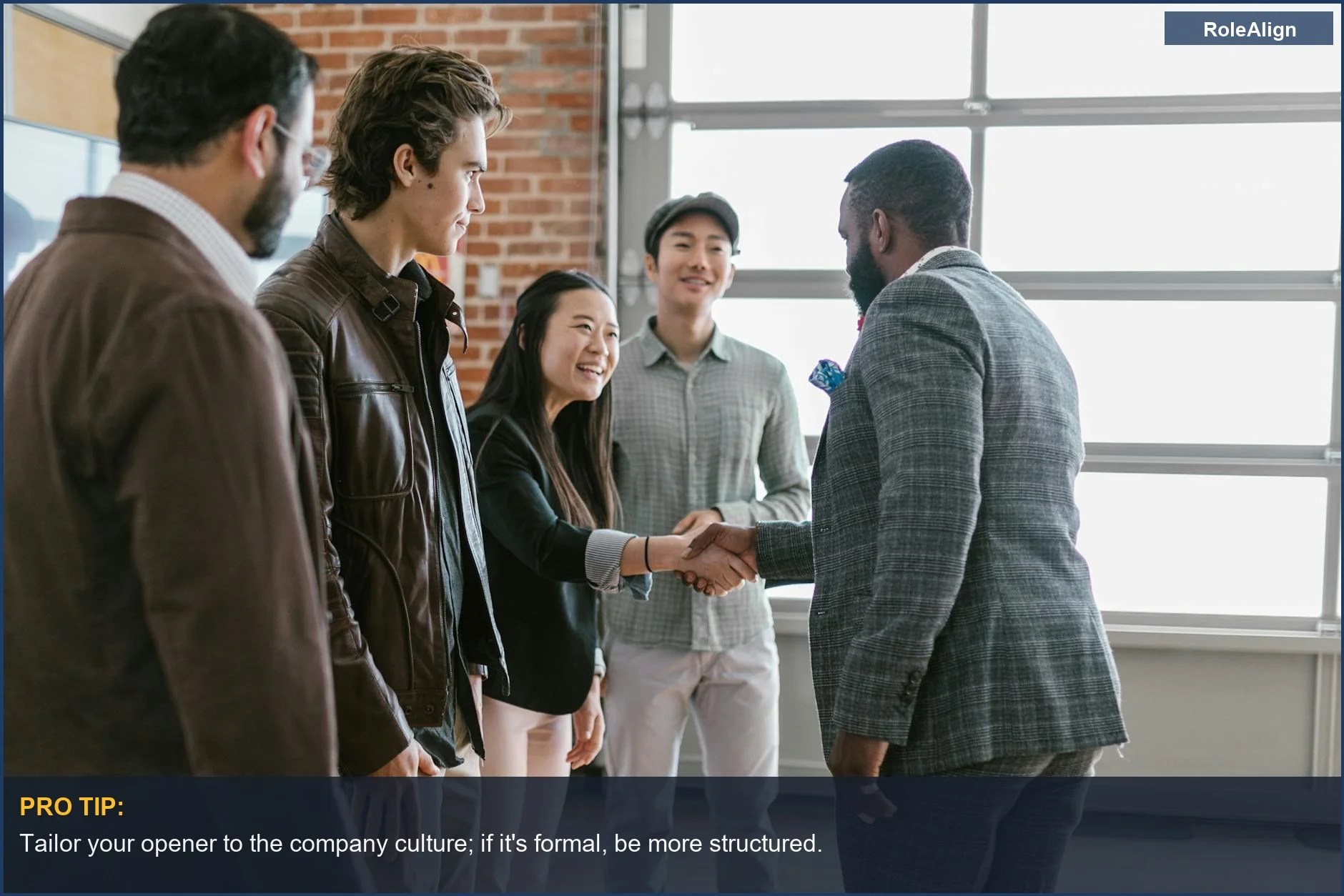Diverse business professionals shaking hands and discussing in a modern office, demonstrating collaboration for interview opener what to say.