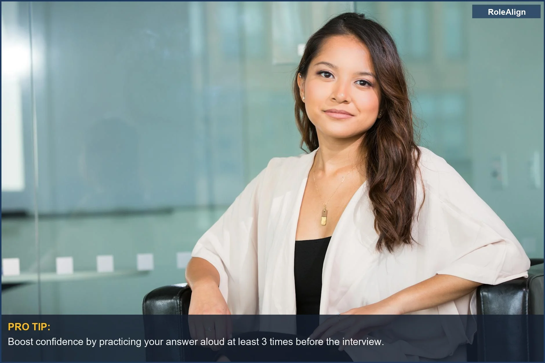 Confident Asian businesswoman in a modern office, ready to discuss her five year plan.
