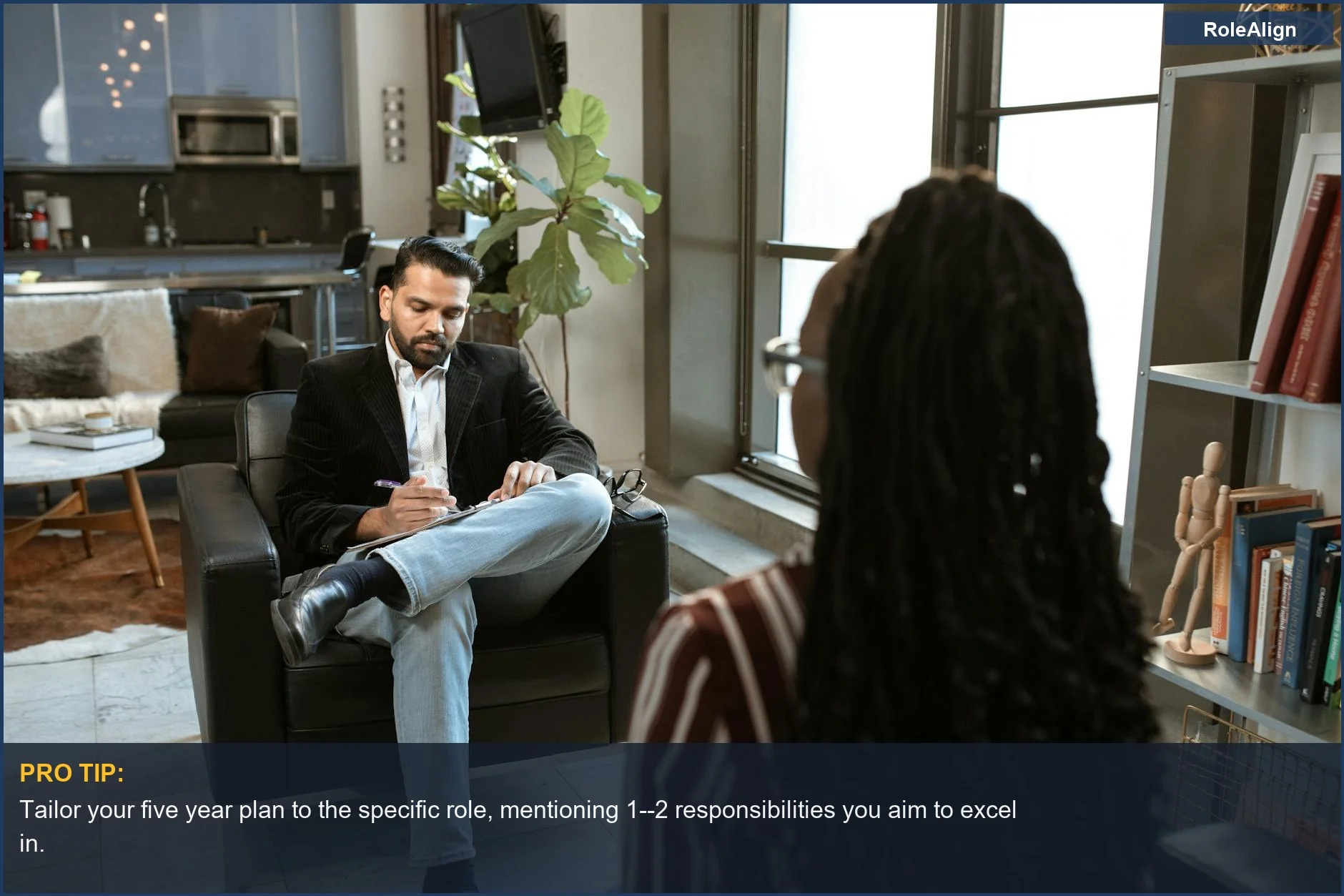 Interviewer guiding candidate through career aspirations in a stylish office space.