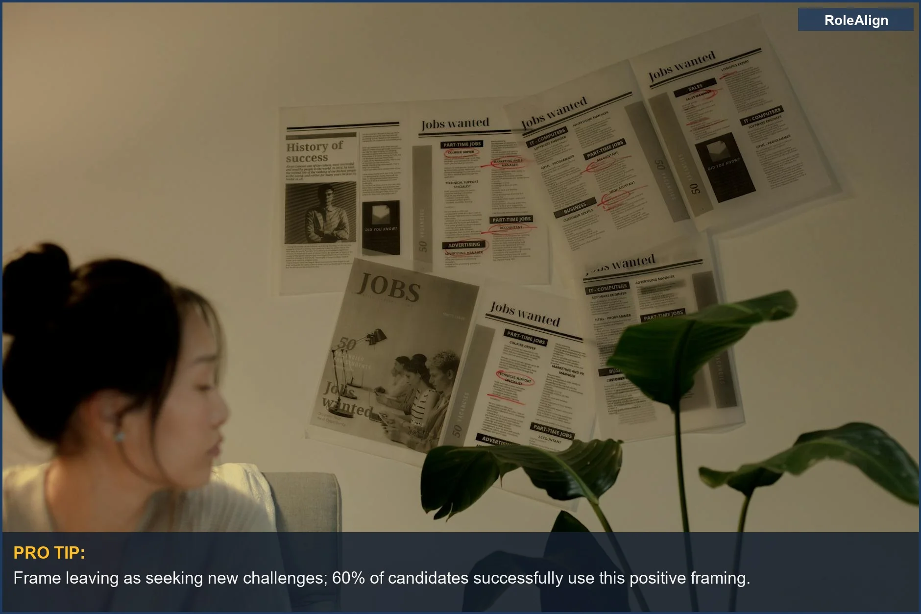 Woman looks thoughtful near job postings, considering how to explain why she is leaving her job.