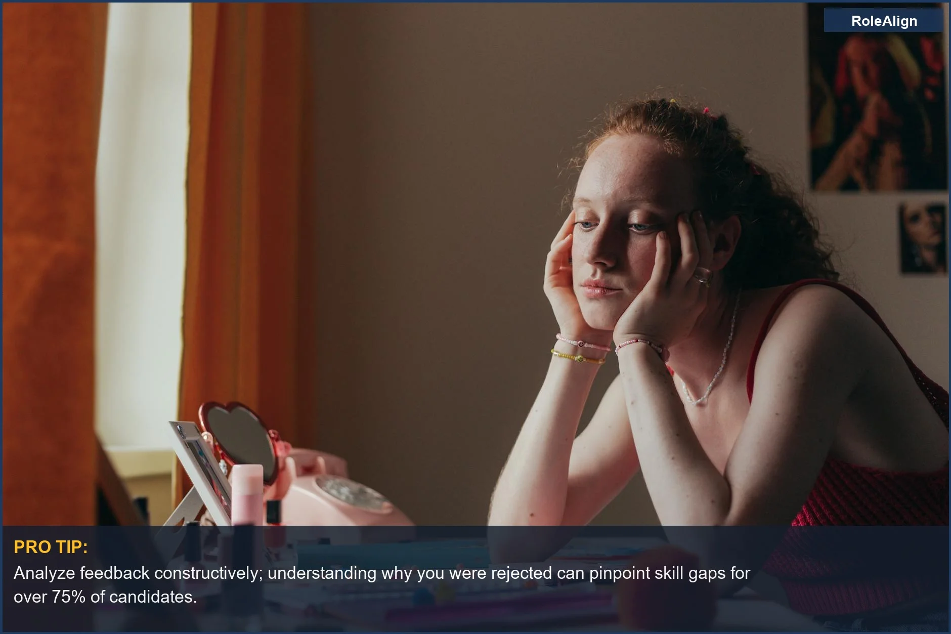 Woman sitting thoughtfully at a vintage desk, reflecting on career decisions after job rejection.