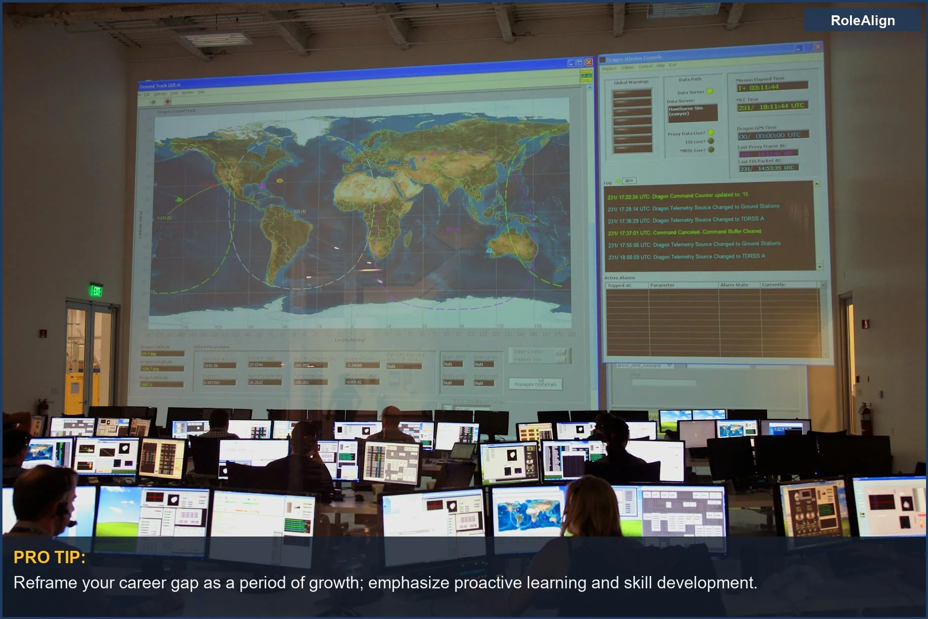 Employees analyze data on large screens in a control room, reframing career gaps positively.
