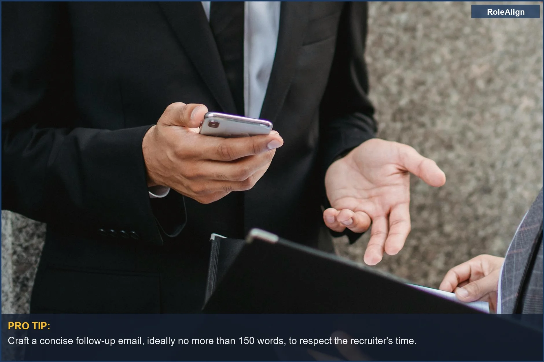 Close-up of professionals reviewing documents and smartphone, stressing communication for interview follow-up success.