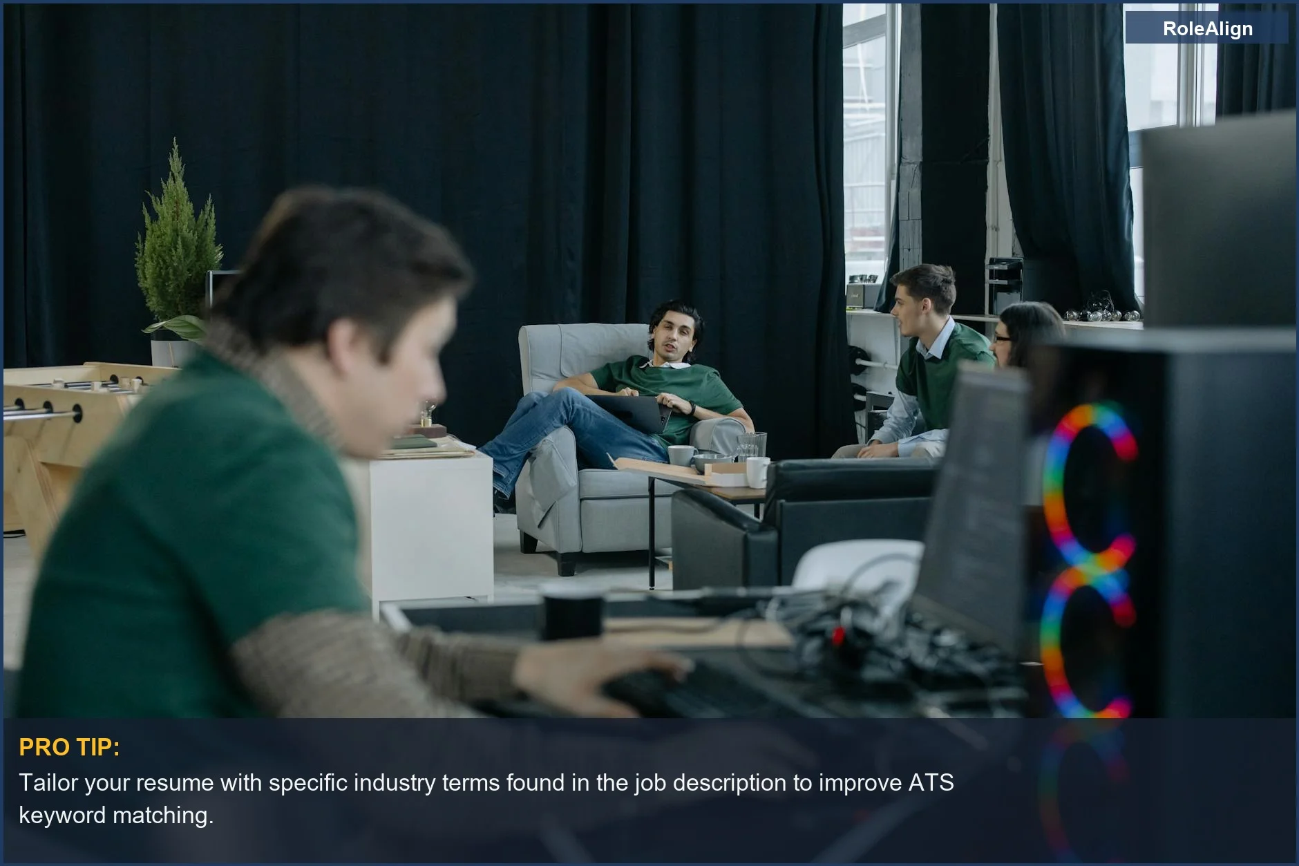 Focused professionals discussing ideas, offering insights on ATS keywords for job applications.