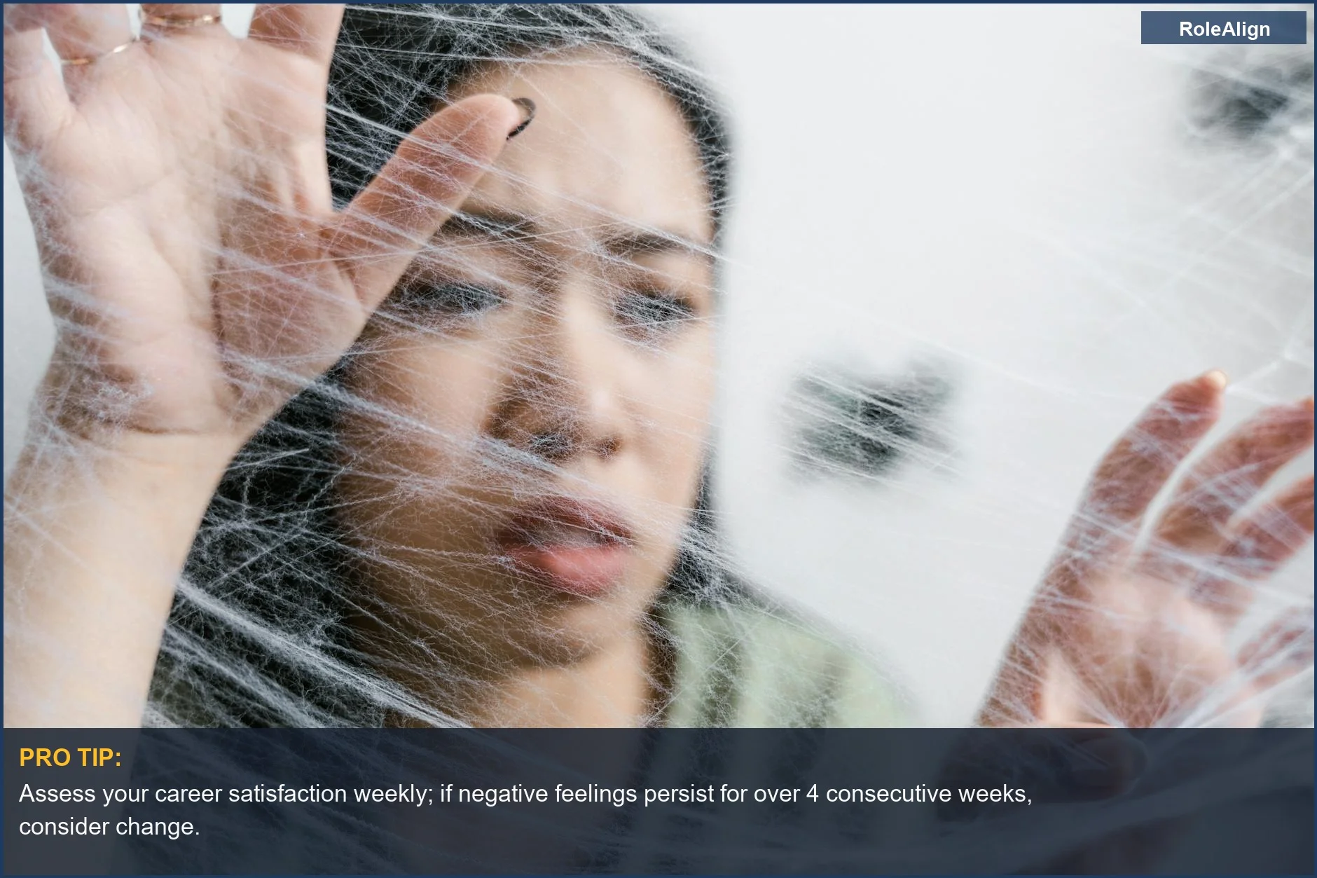 Woman feeling trapped in a spider web, symbolizing the feeling of when it's time to quit your job.