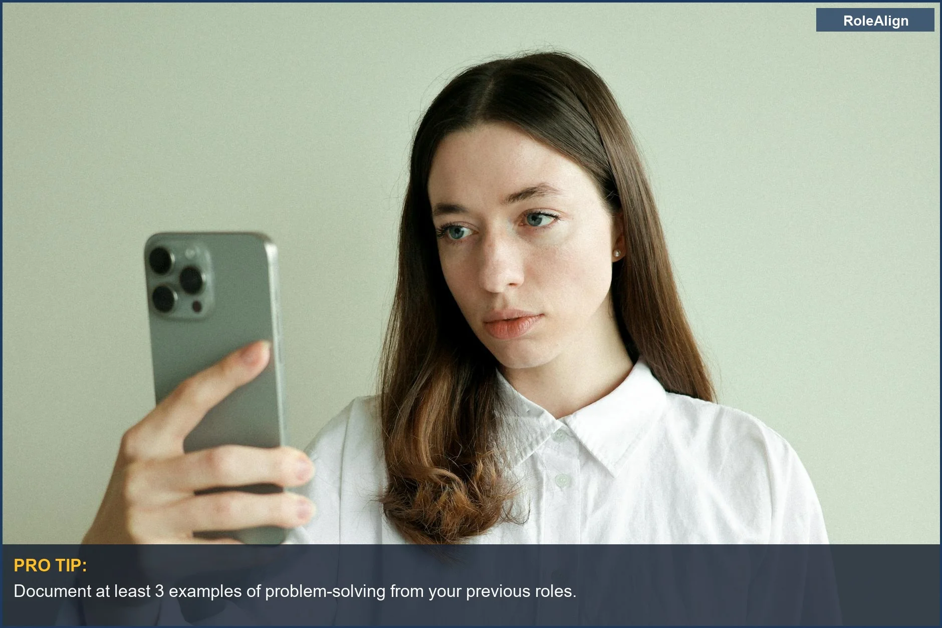 Young woman confidently taking a selfie, highlighting transferable skills for a career pivot.