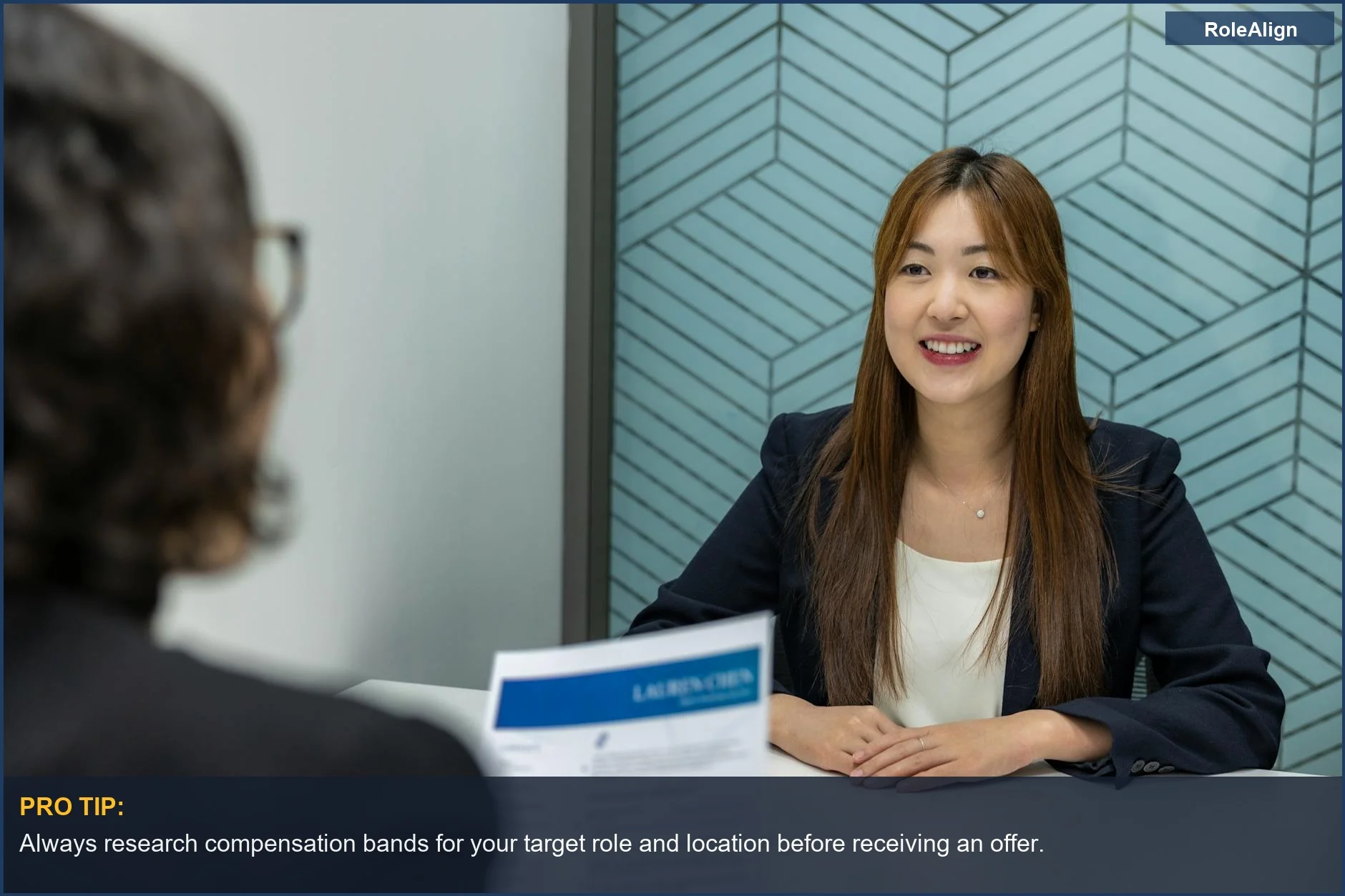 Young woman confidently engaging in a professional business meeting, ready to negotiate salary.