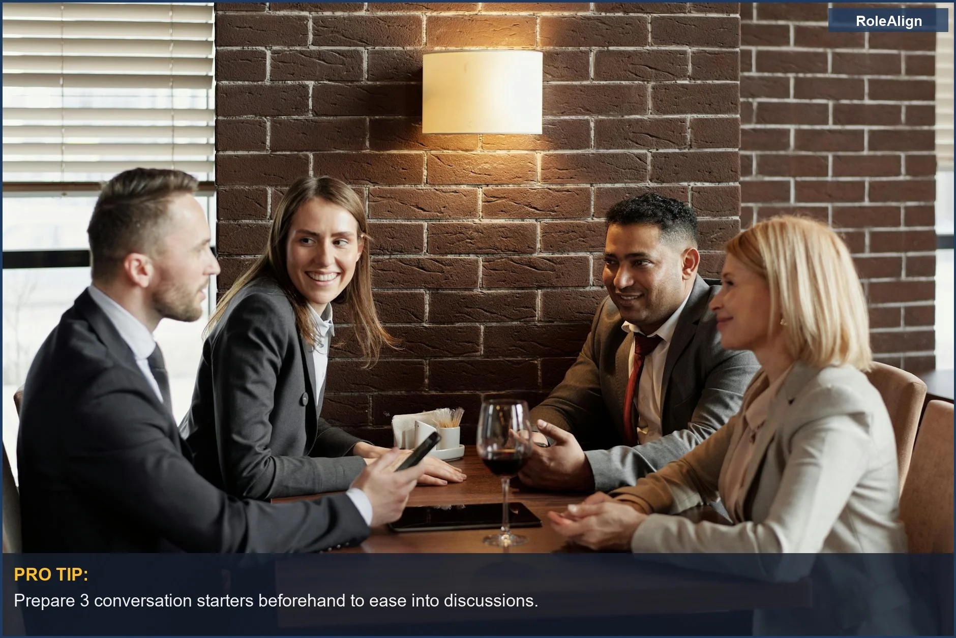 Business professionals in lively discussion, showing effective networking for introverts.