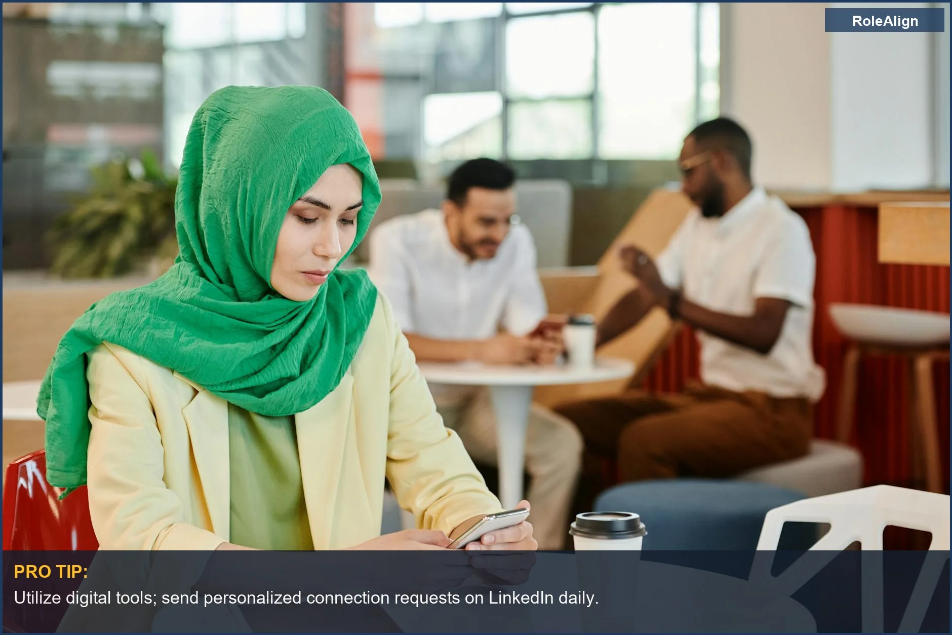 Young woman using phone in cafe, embracing modern networking strategies for introverts.