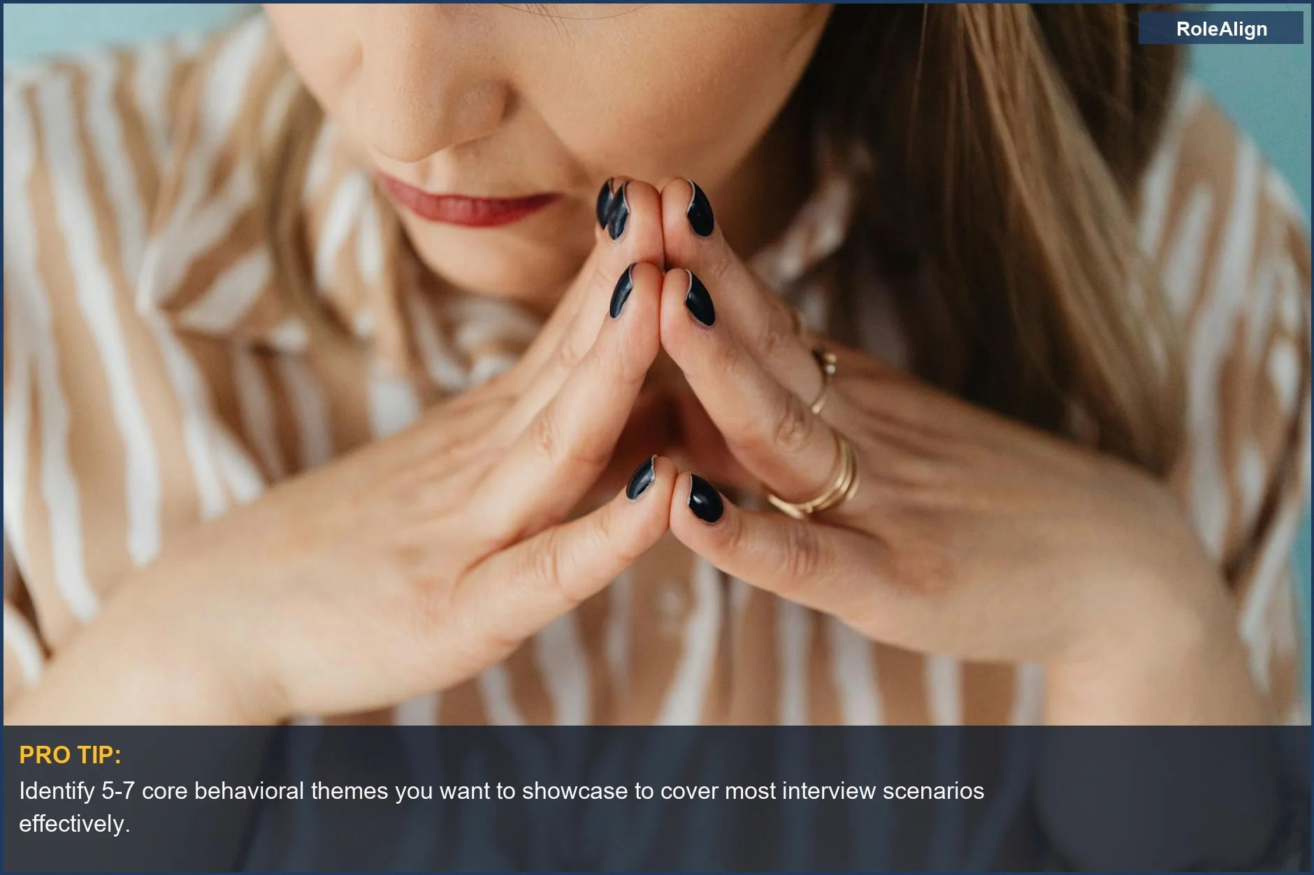 Close-up of a woman with steepled fingers and a thoughtful expression, ideal for STAR method interview preparation.