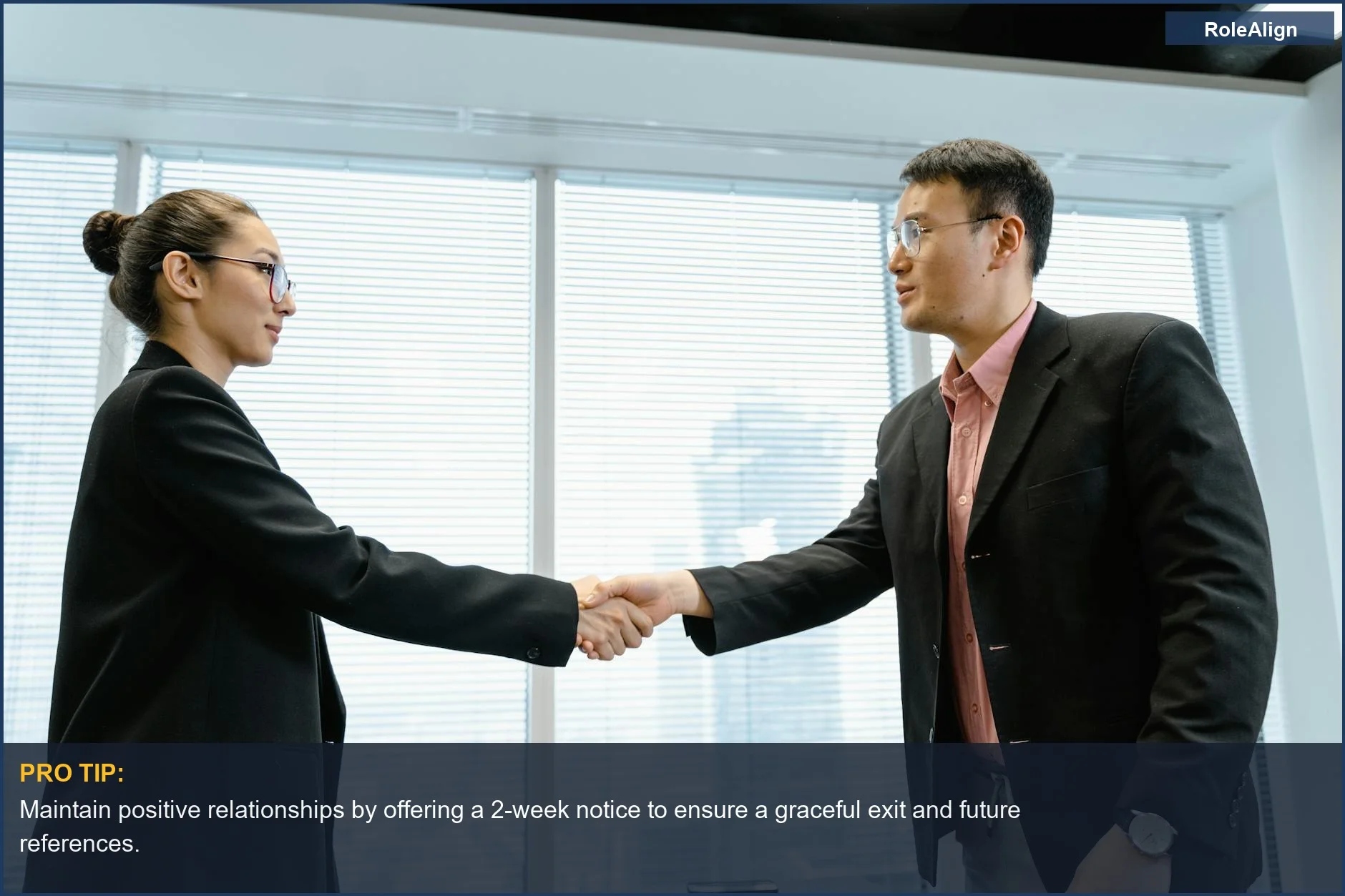 Two diverse business professionals professionally shaking hands in a modern office, symbolizing a smooth job transition.
