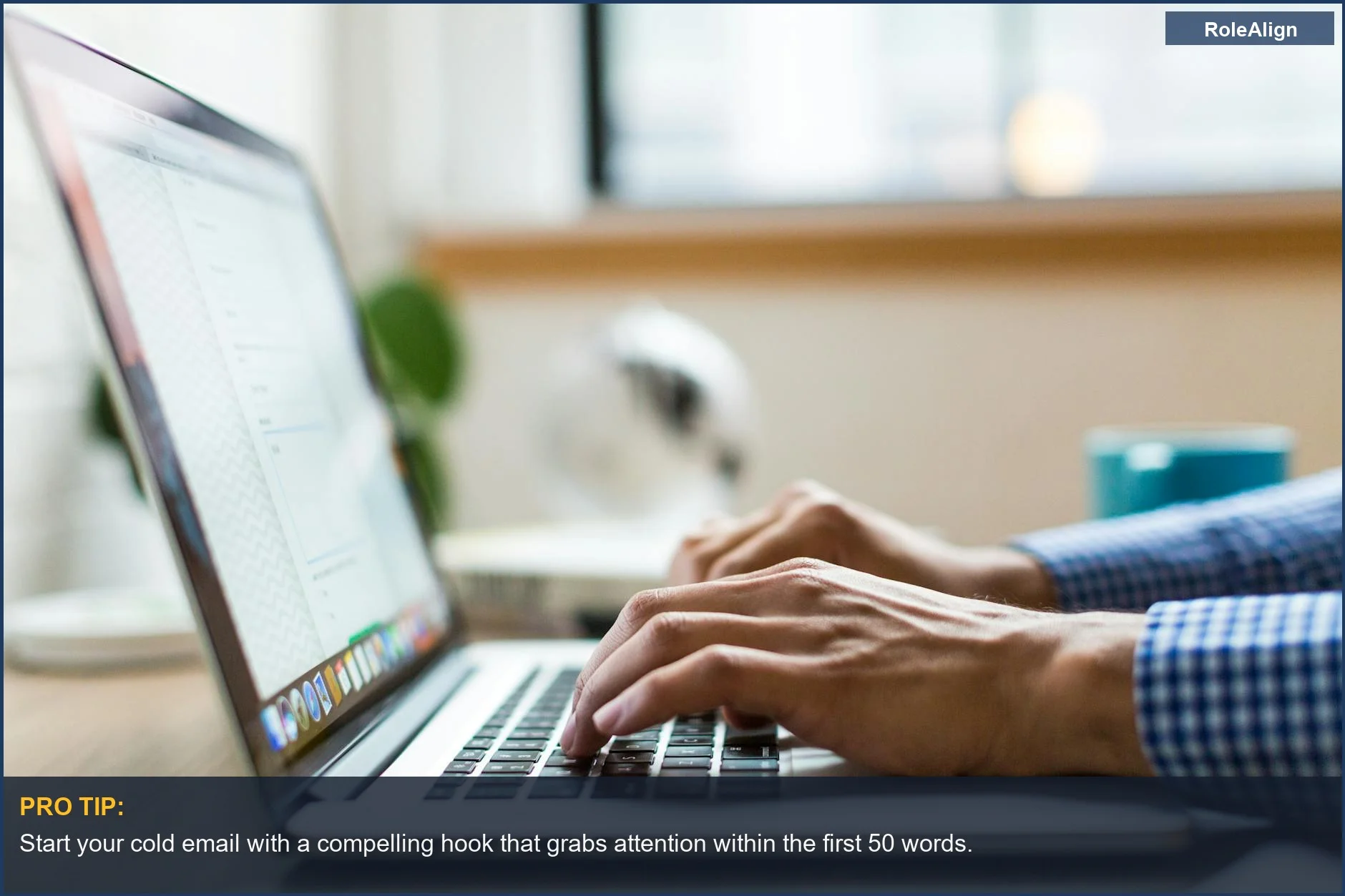 Professional typing on a laptop in a modern office, illustrating effective cold email response strategies.