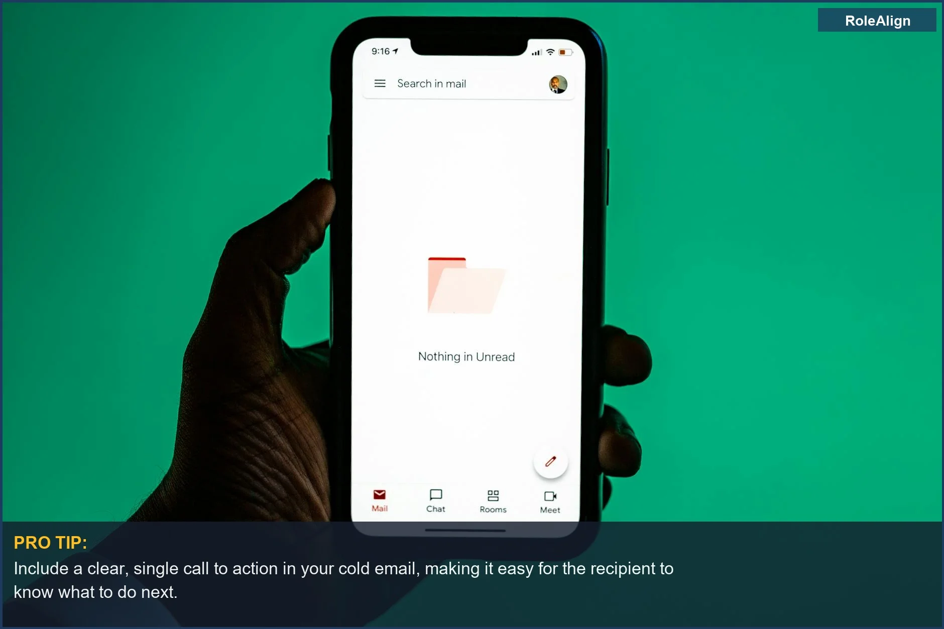 Hand holding smartphone with email app open, demonstrating the impact of personalized cold outreach email techniques.