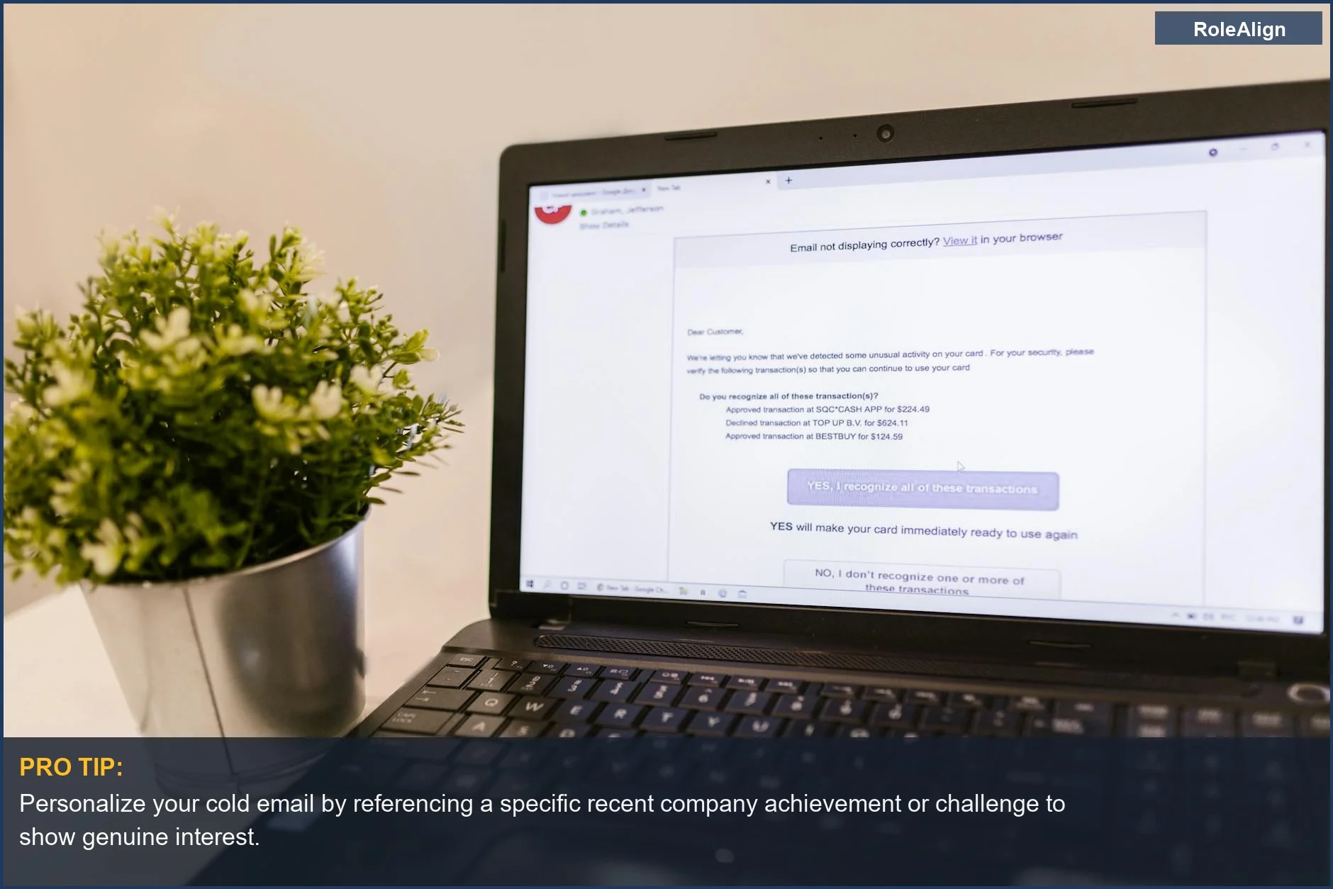 Laptop screen showing an email draft next to a green plant, perfect for cold email response advice.
