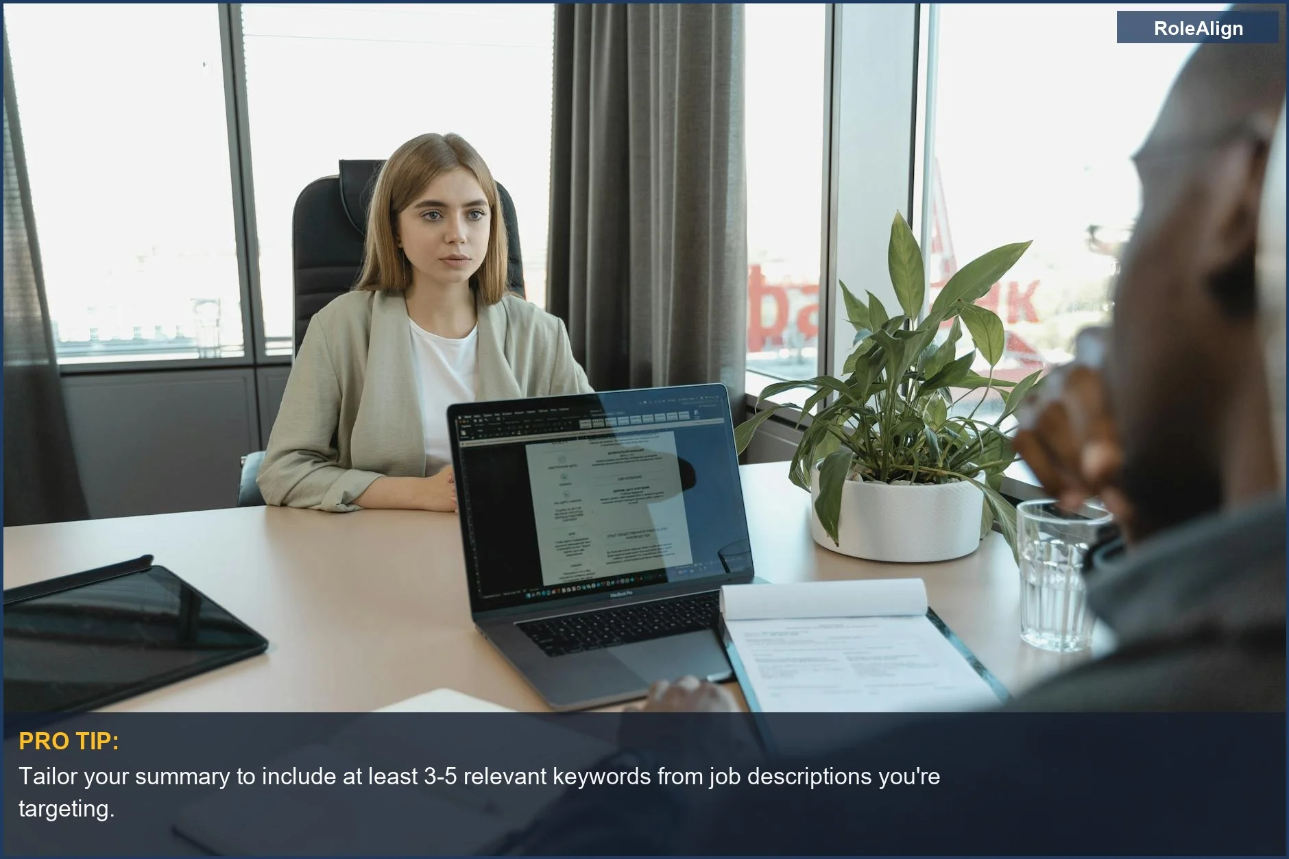 Modern office interview setting, demonstrating effective linkedin profile summary strategies for job seekers.