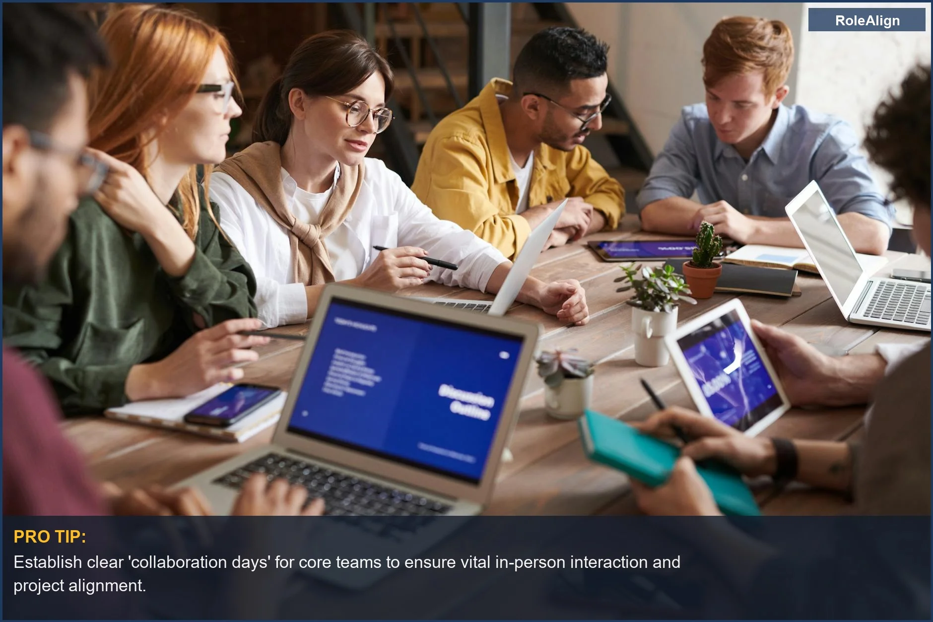 Diverse team in a modern office collaborating on a project, reflecting successful hybrid work strategies.