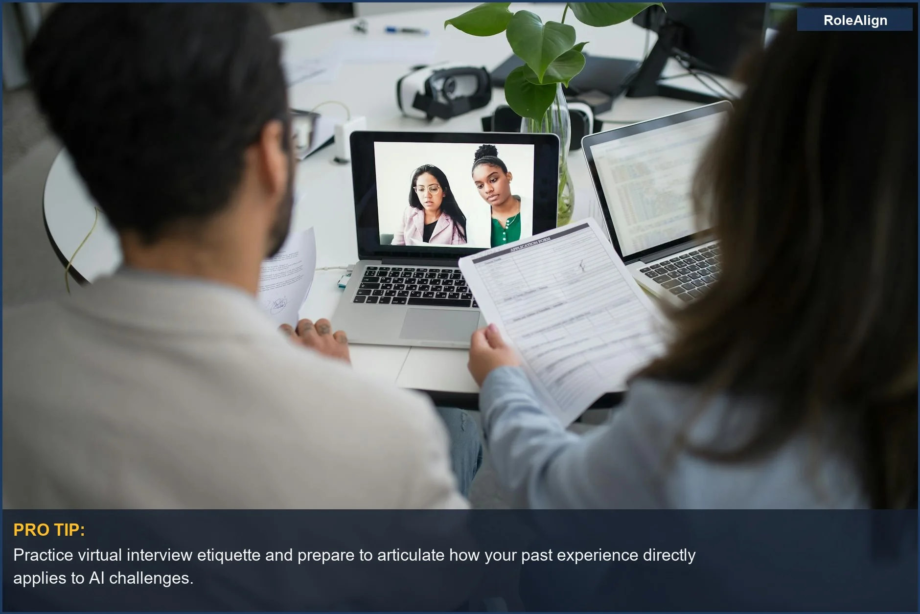 Professionals conduct a virtual job interview via laptops, illustrating remote collaboration in a modern office for an AI career.