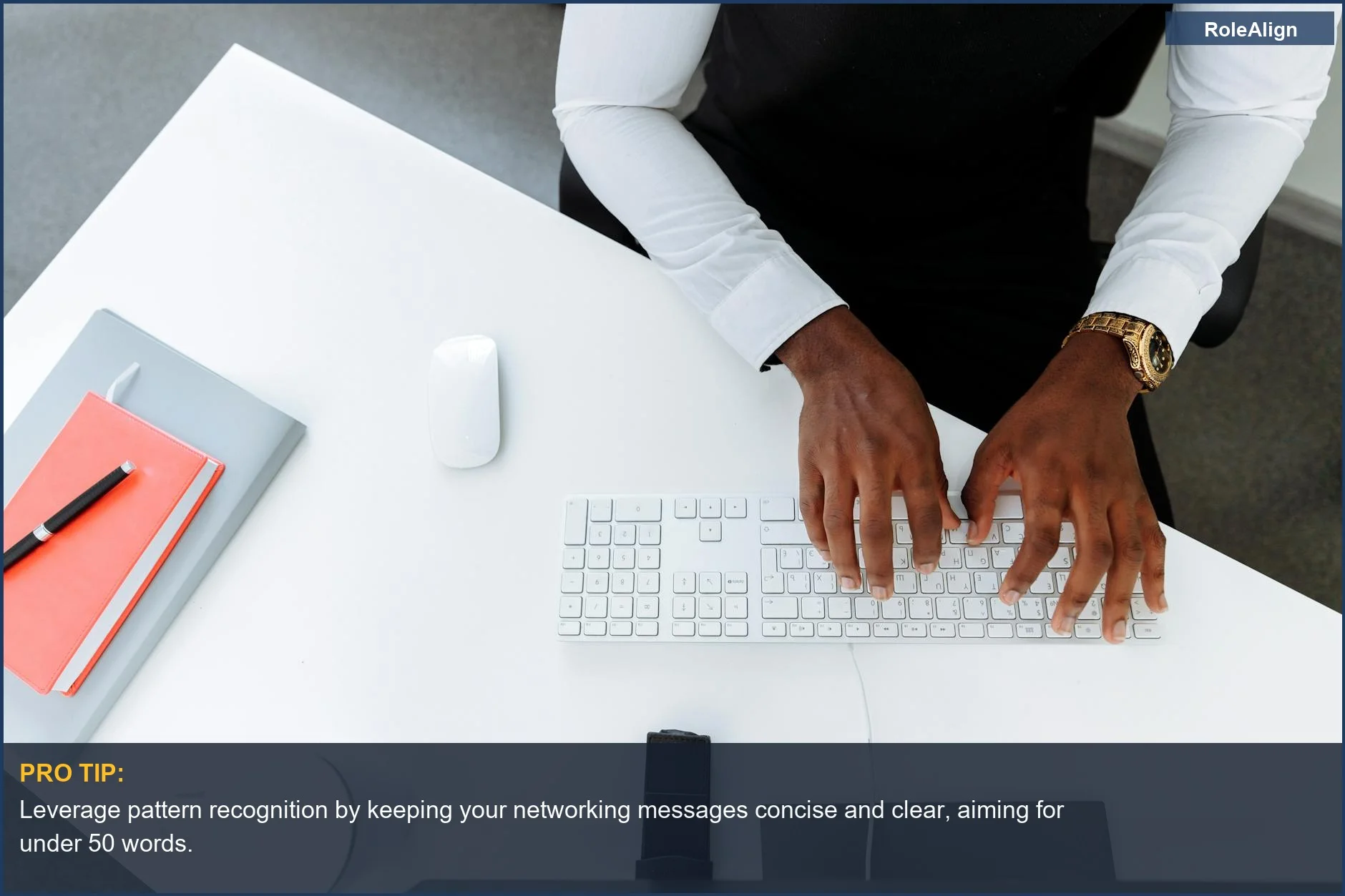 Business professional typing at a modern desk, highlighting the need for efficient networking messages that cut through the noise.