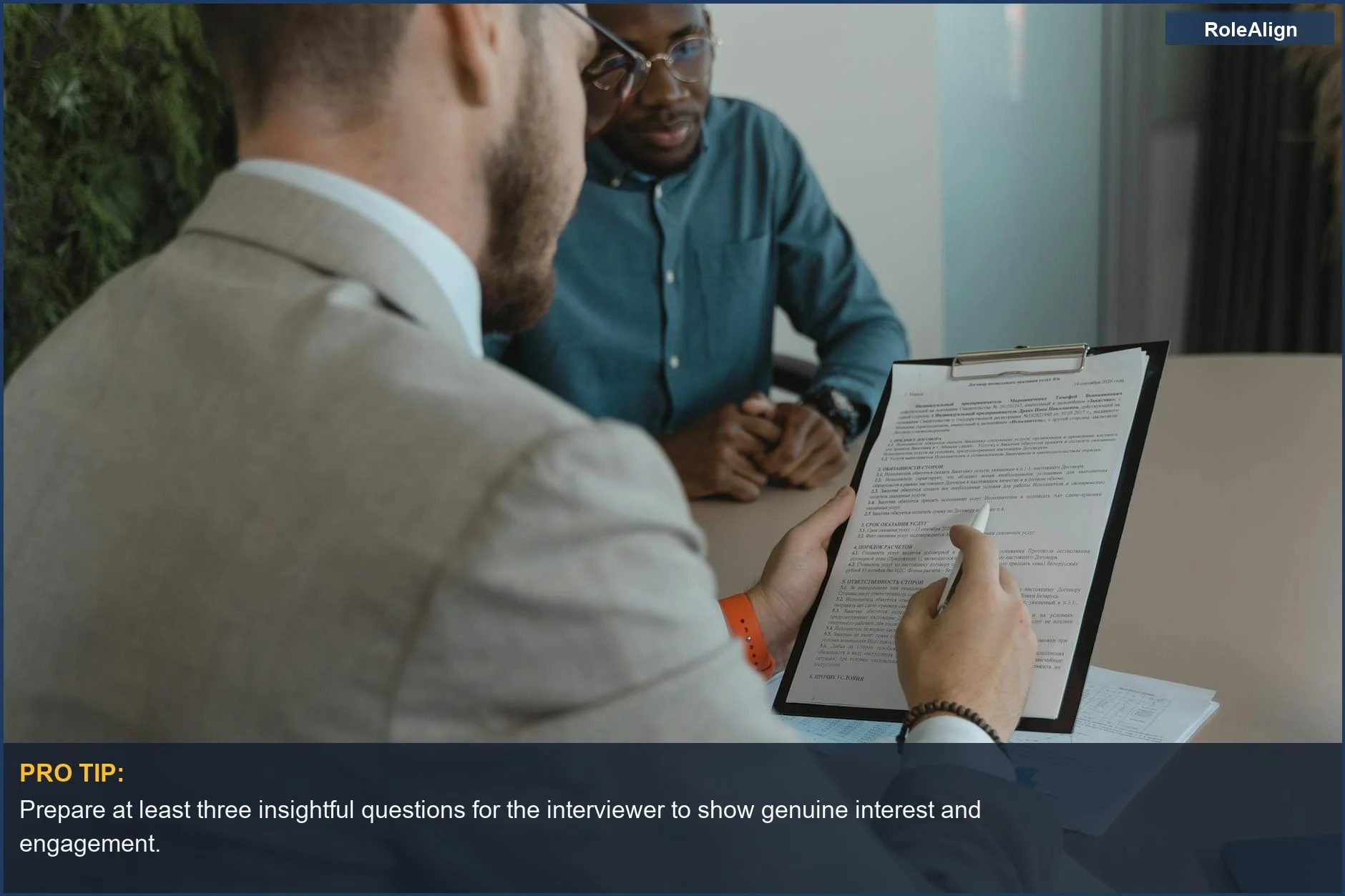 Professional job interview setup with laptop and notes, vital for the recruit CRM hiring process.