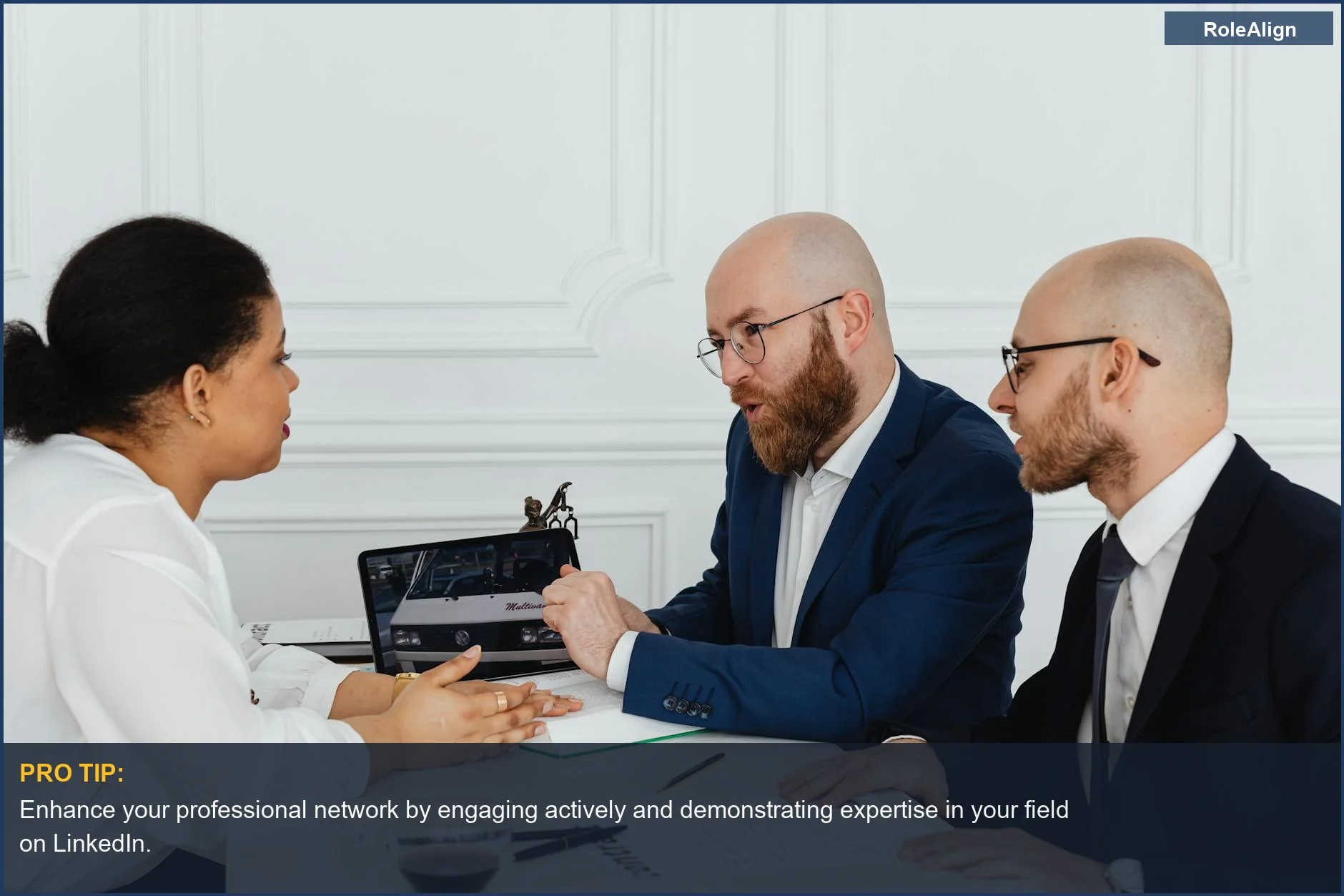 Business professionals collaborating on a project with technology, highlighting the impact of a weak LinkedIn presence.