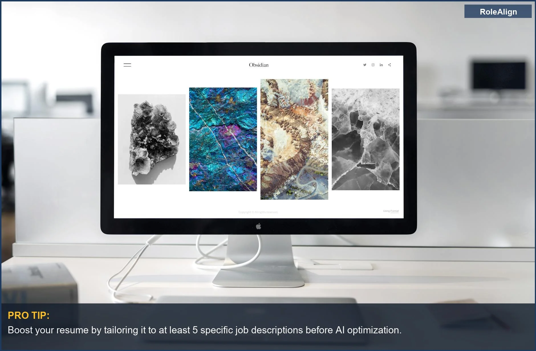 Modern office desk with a sleek monitor displaying abstract art, symbolizing AI's influence on candidate individuality.