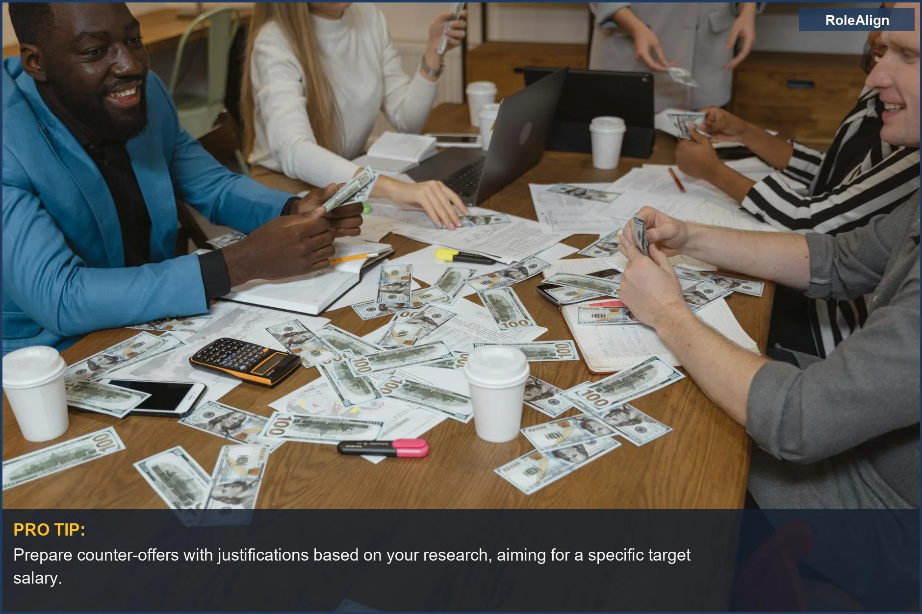 Team in a business meeting with currency, exploring psychological leverage in salary talks.