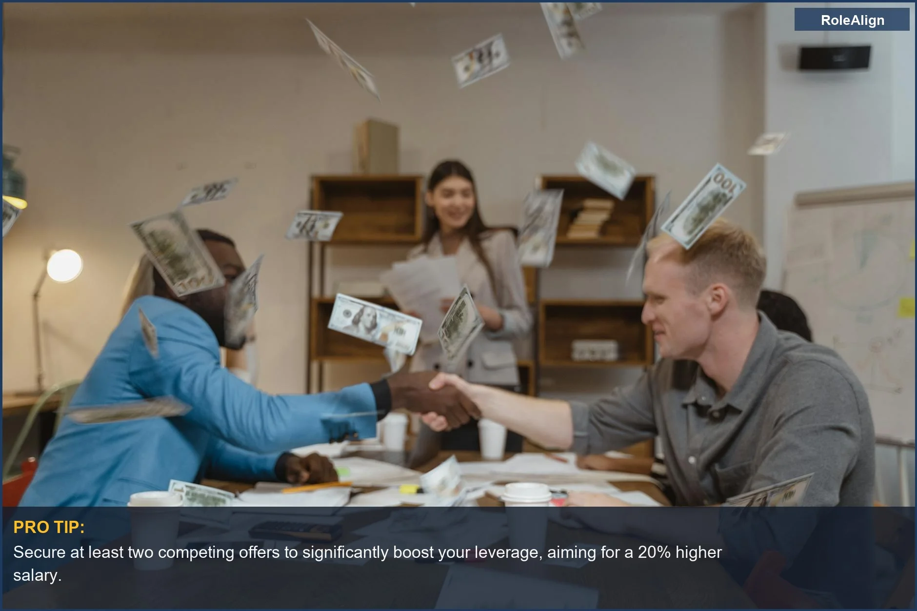 Business professionals shaking hands with money falling, a visual of salary negotiation success.