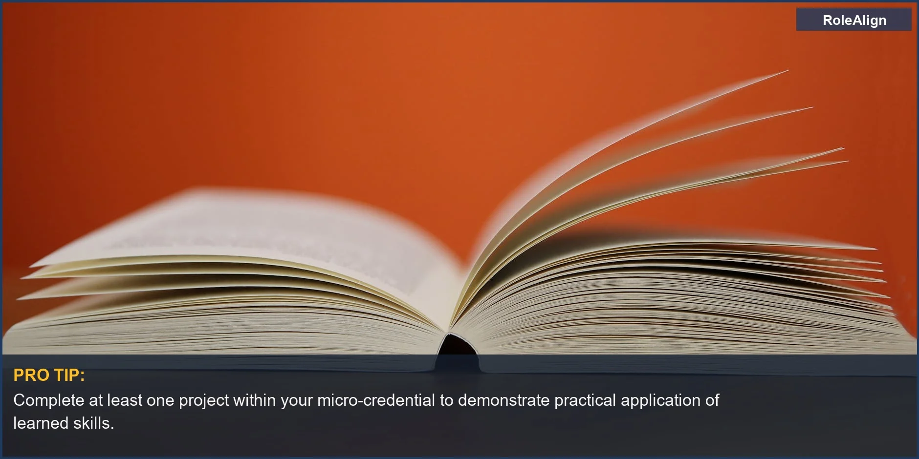 Open book with turning pages against orange, symbolizing knowledge gained from micro-credentials for career growth.