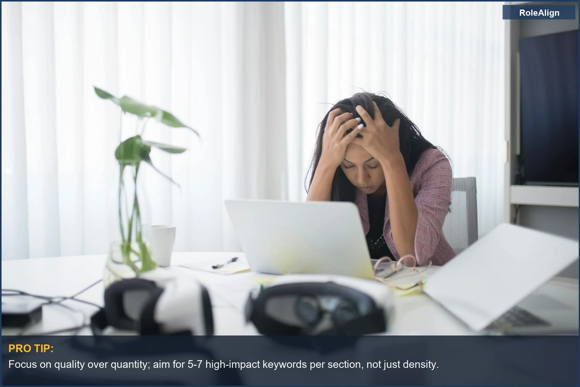 Frustrated woman stressed at desk with laptop, highlighting the unintended consequences of AI resume keyword stuffing.