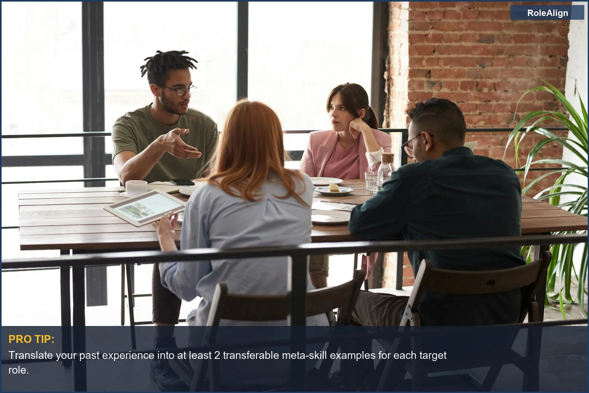 Professionals in creative meeting discuss transferable meta-skills for a career pivot.